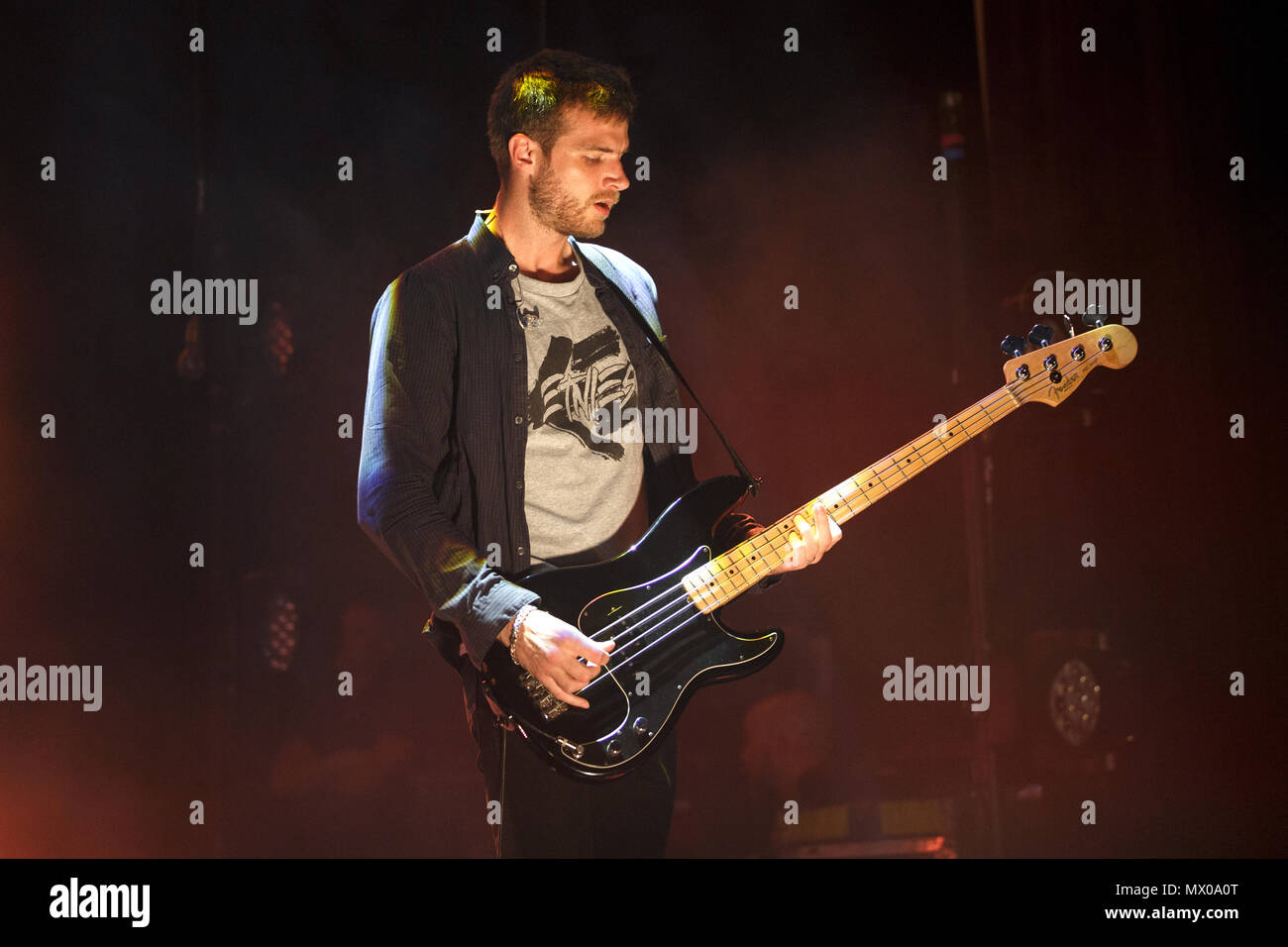 Rupert Shepherd, bass guitarist of The Maccabees, live onstage on the opening night of the band's farewell tour in 2017. Rupert Shepherd bass guitarist, The Maccabees live, The Maccabees in concert, Fender bass guitar. Stock Photo