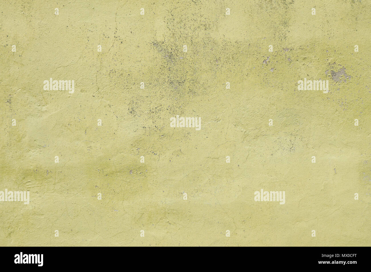 weathered green wall background texture pattern with cracked plaster Stock Photo