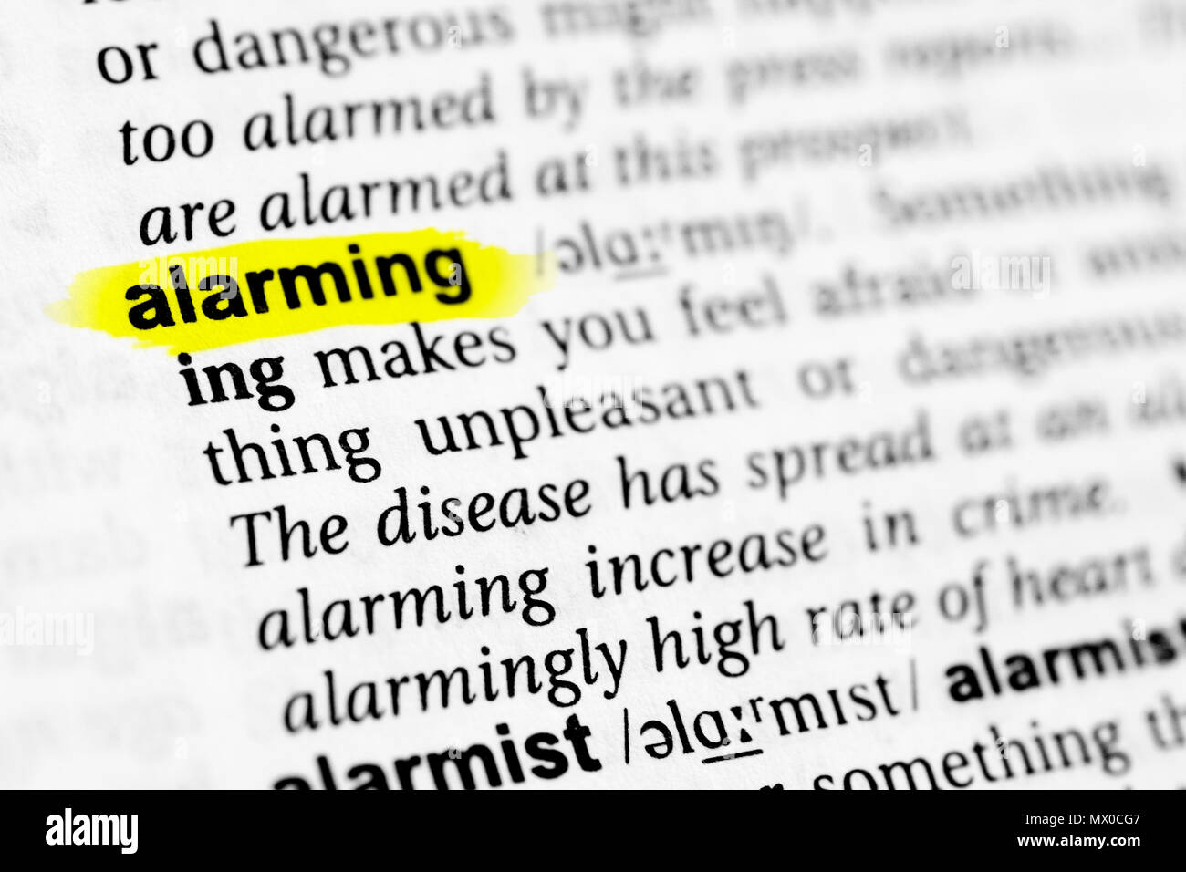 Highlighted English word "alarming" and its definition in the