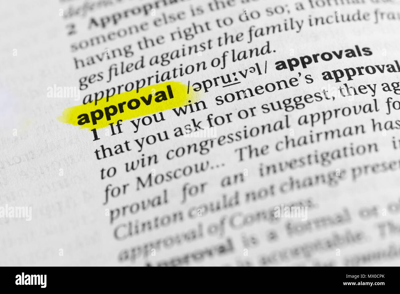 Highlighted English word "approval" and its definition in the