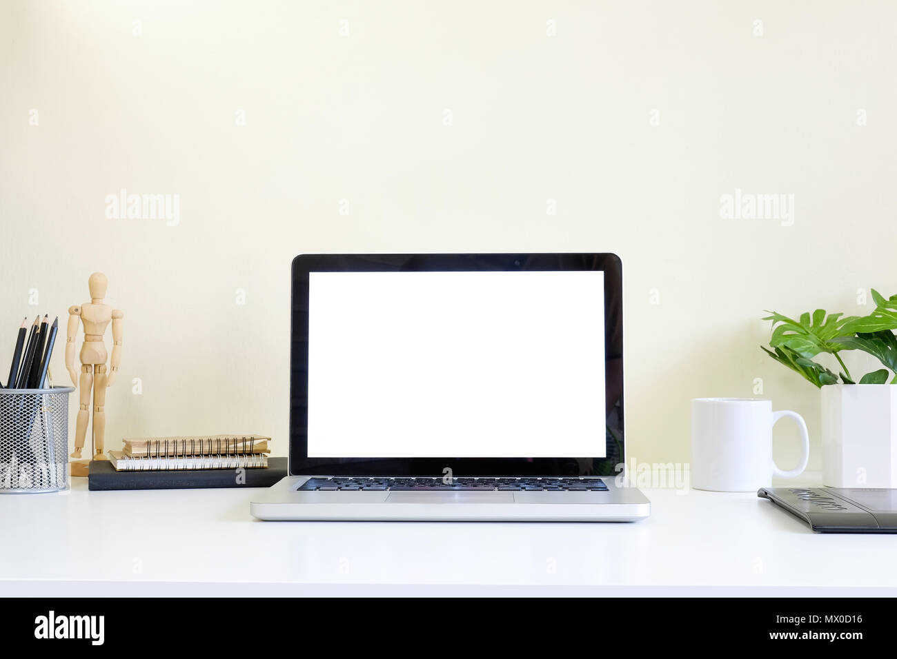 Download Workspace With Laptop Computer On White Table And Yellow Background Mockup Space Stock Photo Alamy PSD Mockup Templates