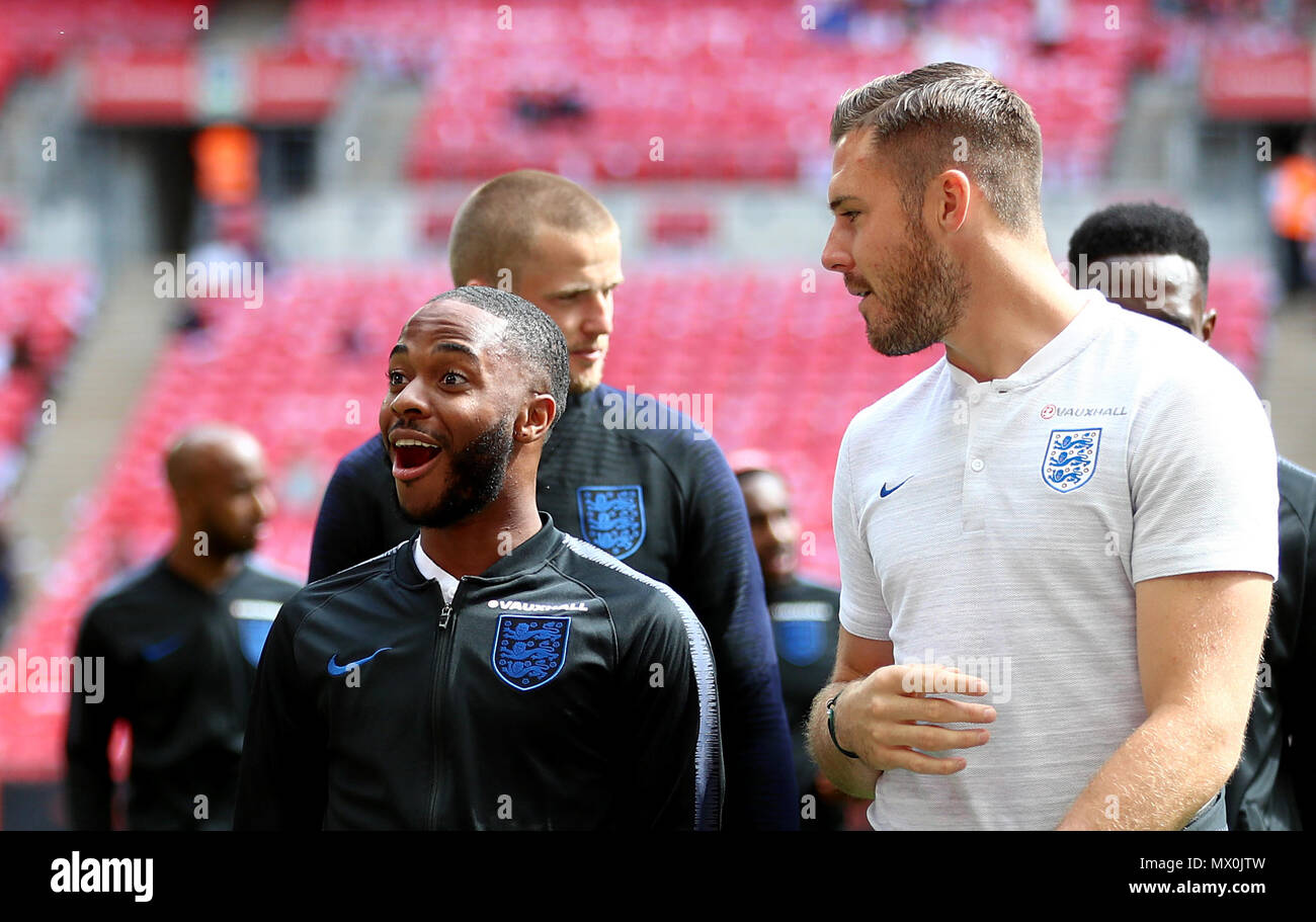 England's (left-right) Raheem Sterling and Jack Butland during the International Friendly match at WembleyÂ Stadium, London. Stock Photo