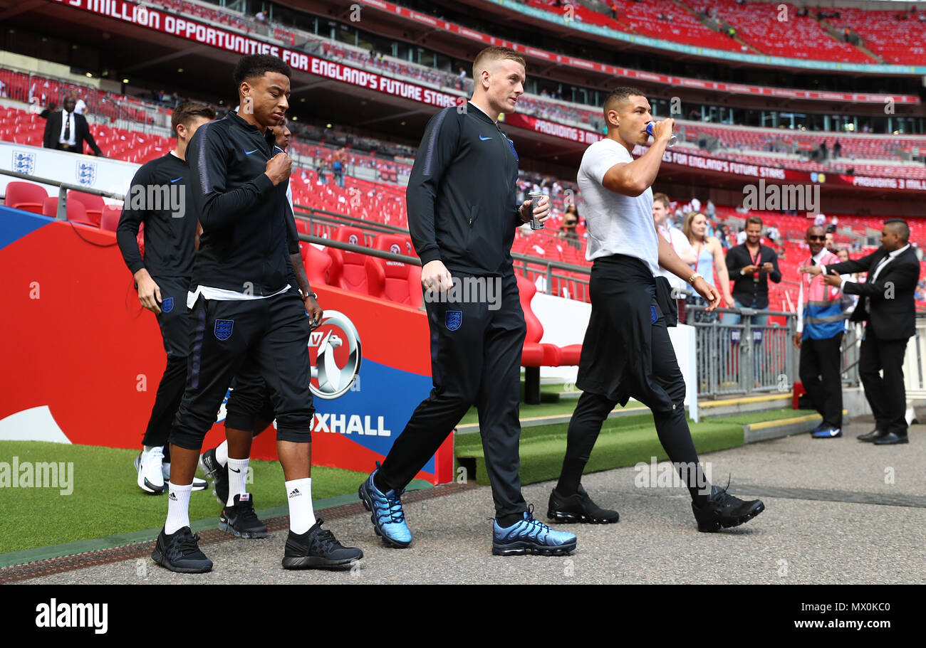 England's (left-right) Jesse Lingard, Jordan Pickford and Jake Livermore during the International Friendly match at WembleyÂ Stadium, London. Stock Photo