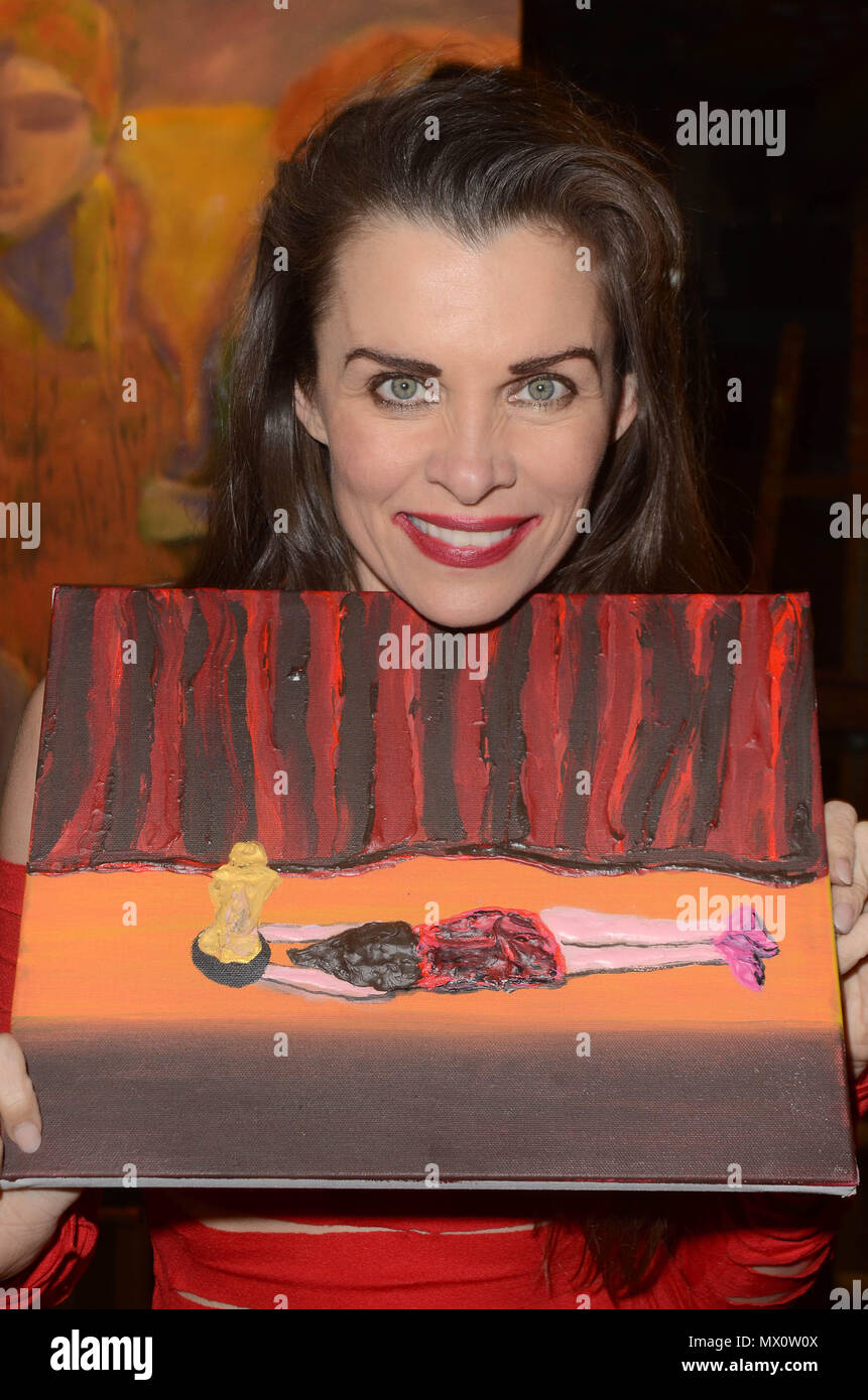 Alicia Arden unveils her painting wearing a red skimpy dress in Los Angeles  Featuring: Alicia Arden Where: Los Angeles, California, United States When: 01 May 2018 Credit: WENN.com Stock Photo