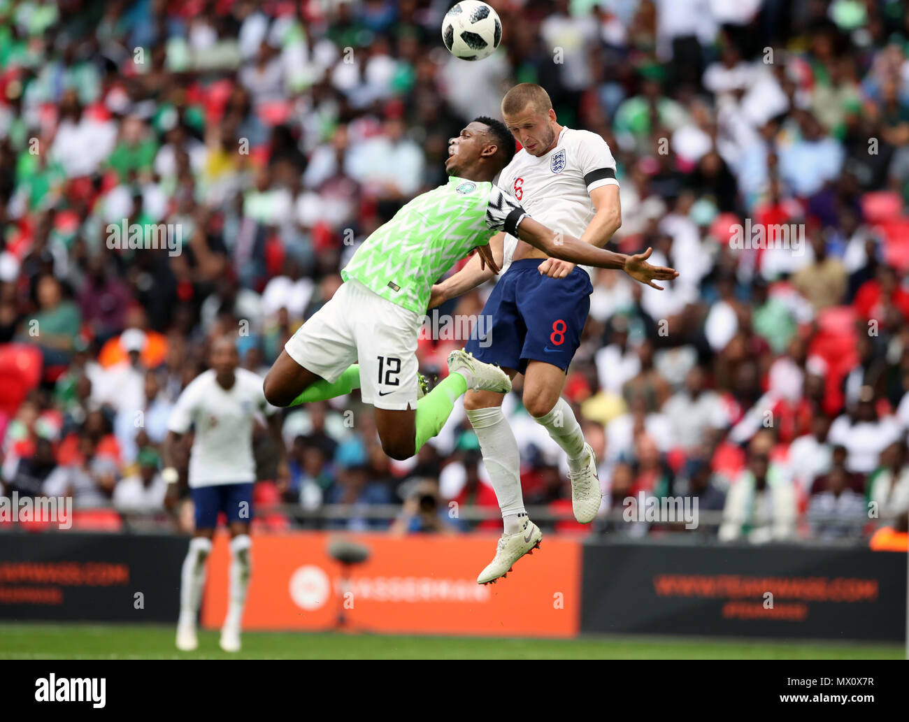 England's Eric Dier (right) and Nigeria's Shehu Abdullahi battle for the ball during the International Friendly match at Wembley Stadium, London. Stock Photo