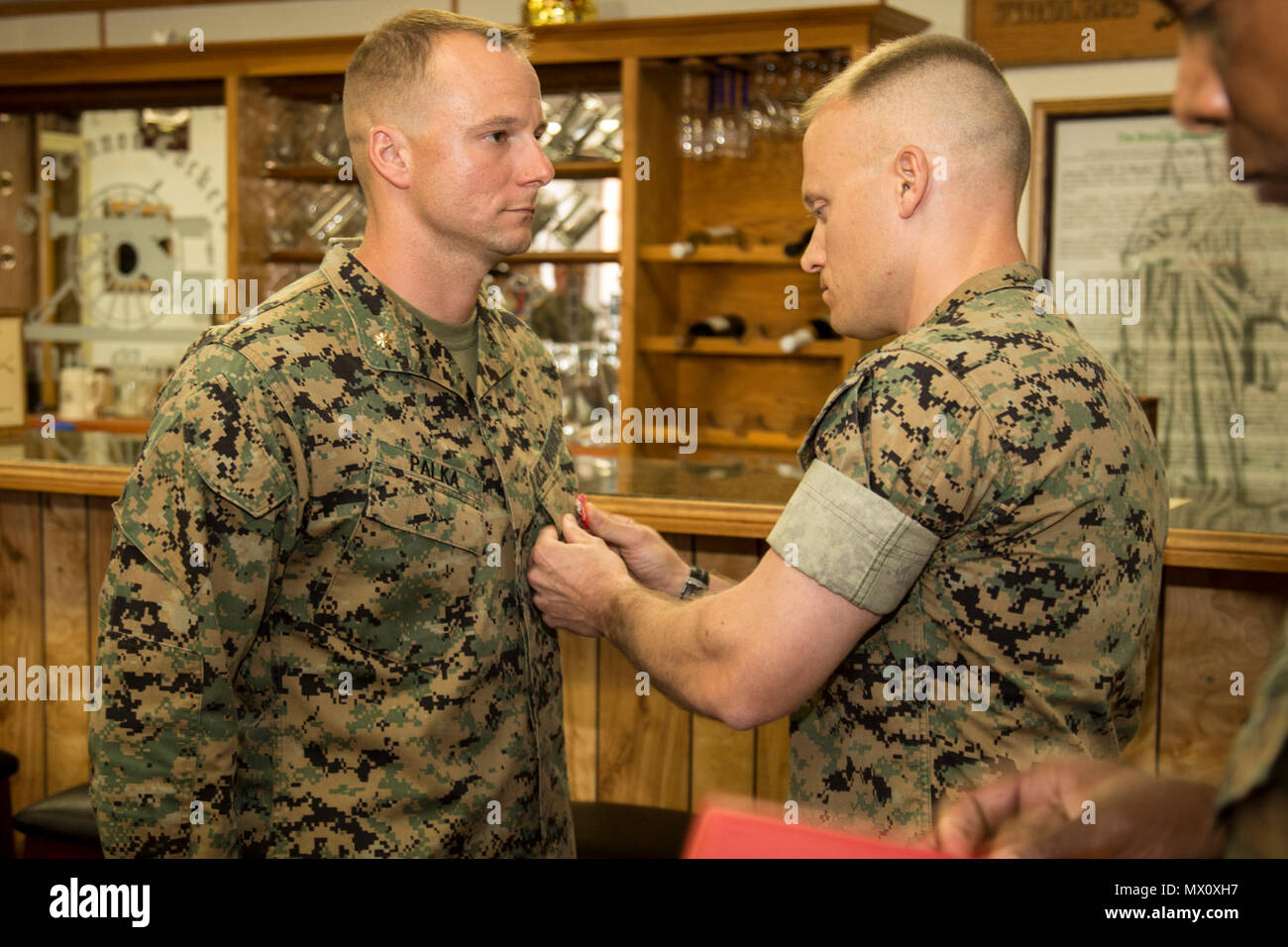 U.S. Marine Corps Maj. David J. Palka, assistant battalion inspector-instructor, 5th Battalion, 14th Marine Regiment, 4th Marine Division, is presented the Bronze Star with 'V' device for valor during a Bronze Star Presentation on Camp Pendleton, Calif., May 1, 2017.  Maj. Palka received the Bronze Star for heroic service in connection with combat operations against the enemy while serving as a Commander, Battery E, Battalion Landing Team, 2nd Battalion 6th Marine Regiment, 26th Marine Expeditionary Unit, in support of Operation Inherent Resolve from 12 March to 25 May 2016. Stock Photo