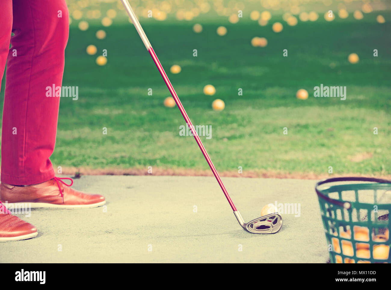 Golf striking ball grass hires stock photography and images Alamy