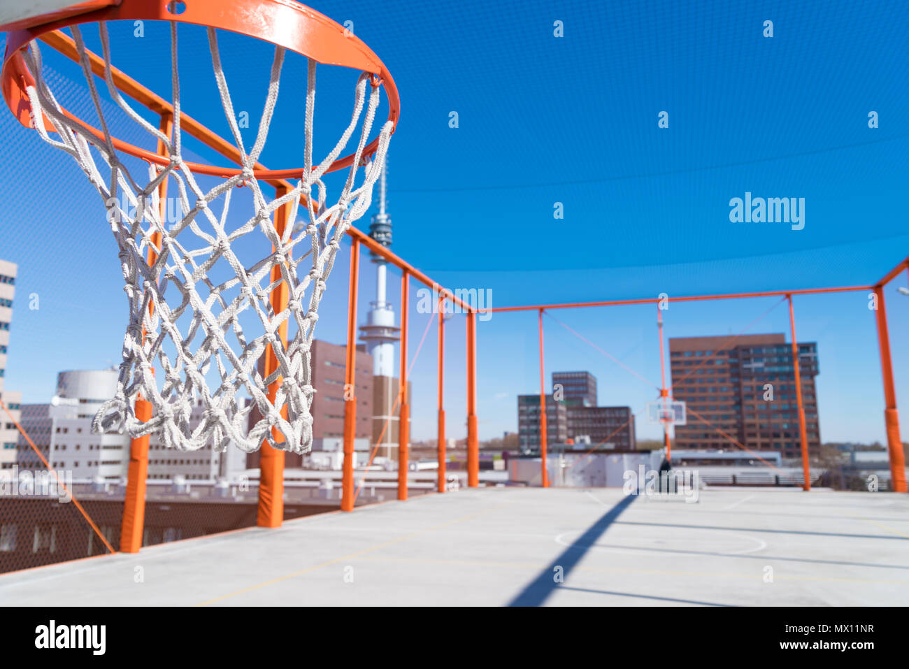 basketball bucket on an outdoor roof basketball field Stock Photo Alamy