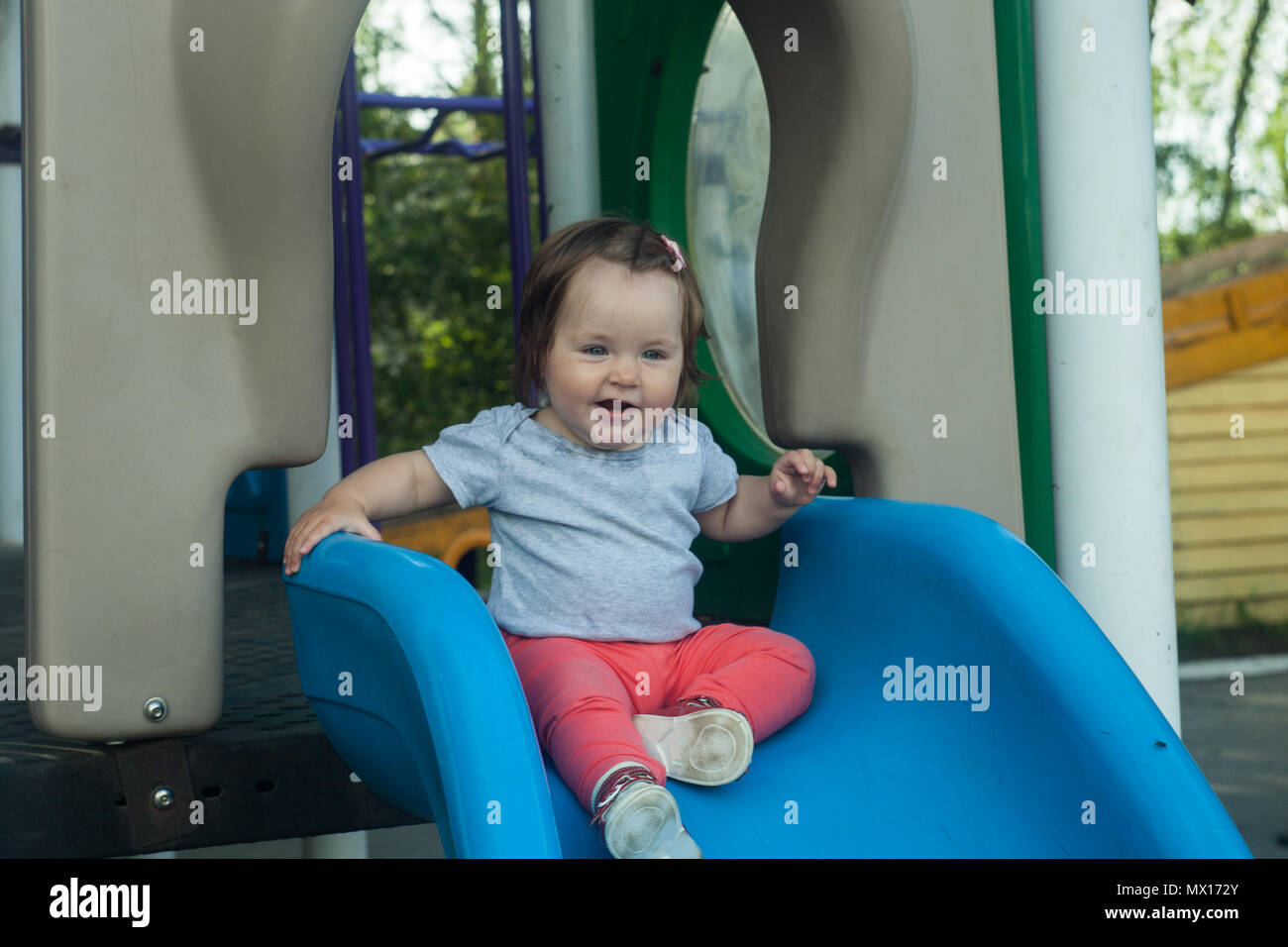 Woman Sliding Down Hill on Kids Ride on Toy