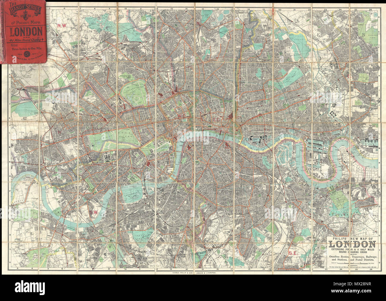 . Philips' New Map of London Extending Four & a Half Miles Round Charing Cross.  English: A stunning example of George Philip's c. 1985 folding pocket map of London, England. Covers the urban center of London from Barnes in the west to Victoria Dock in the east, as well as north as far as Finsbury Park and south as far as Brockwell Park, thus covering London in a roughly 4.5 mile radius from Charing Cross. Offers incredible detail at a scale of 3 inches to 1 mile, with notation for all major streets, trains lines, parks, docks, districts, and important buildings. Issued as part of the Handy Se Stock Photo