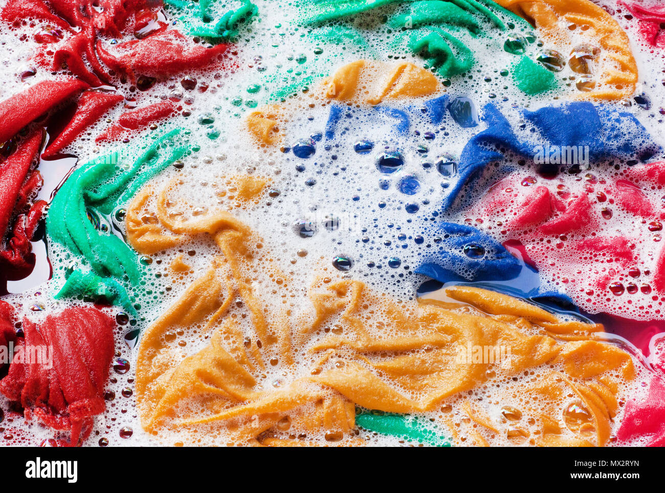 Soak a cloth before washing, Color clothes Stock Photo Alamy