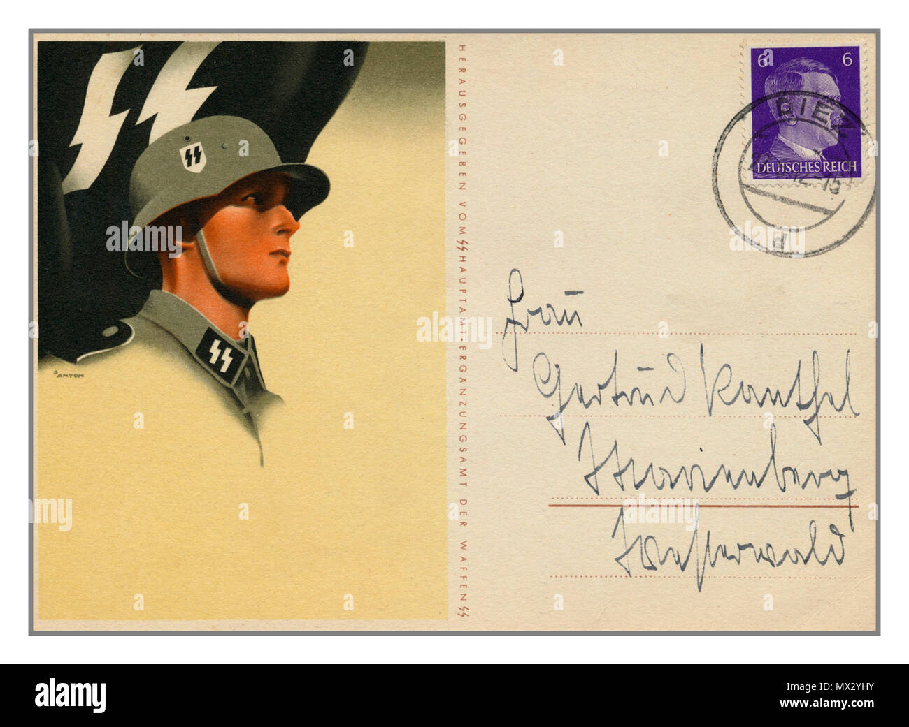 Vintage WW2 Propaganda Waffen SS soldier illustration Postcard 1940’s with franked stamp of Adolf Hitler Deutches Reich Stock Photo