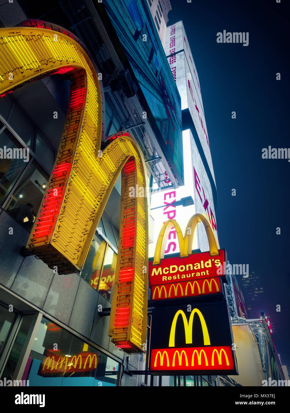 New York City, USA - April 2018: Mac Donald Logo at times square midtown at night Stock Photo