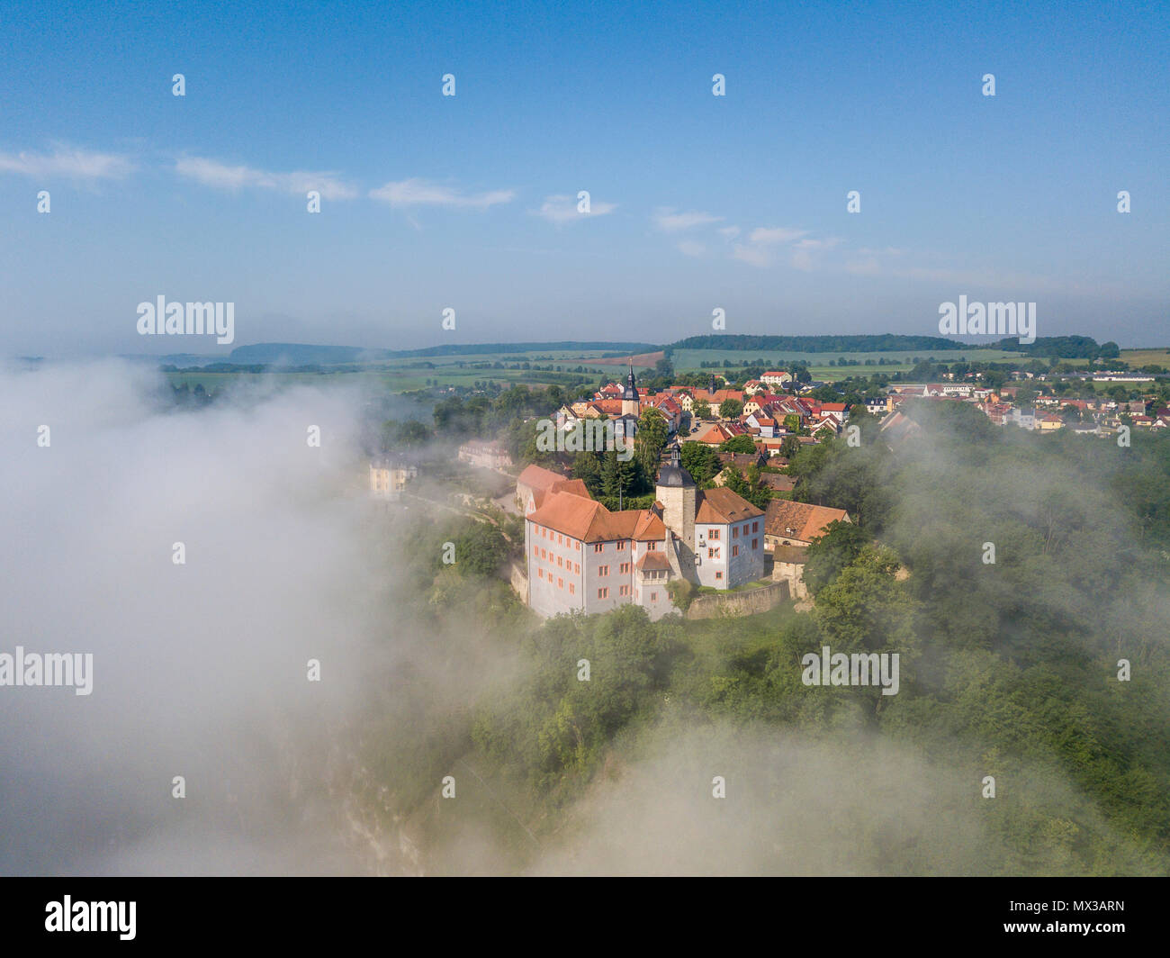 Three castles seen over cloud sea in Dornburg, Thuringia, Germany Stock Photo