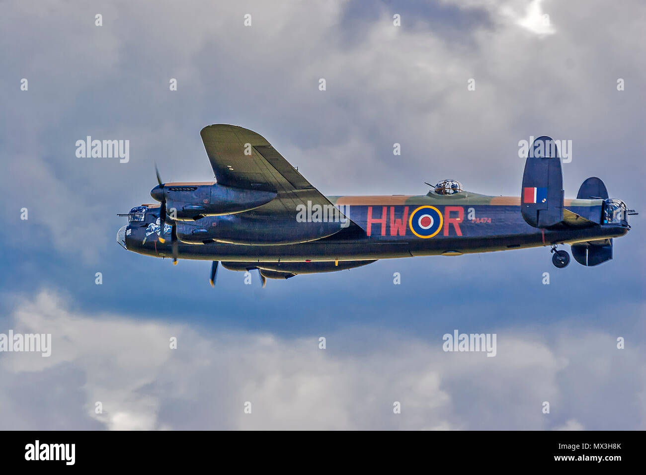 Avro Lancaster Bomber In Flight, Duxford, UK Stock Photo