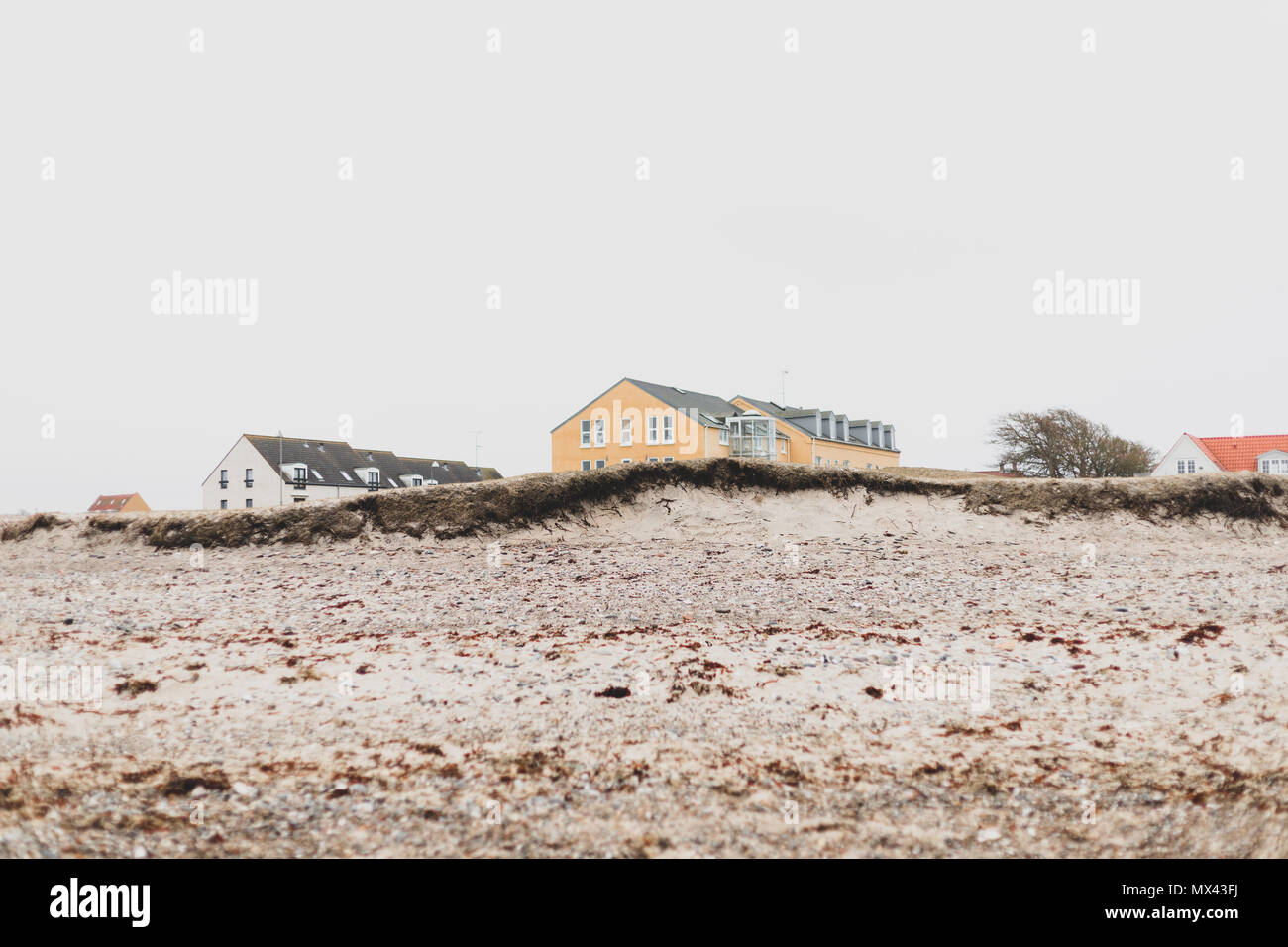 Colorful houses in the seashore, danish beach Stock Photo Alamy