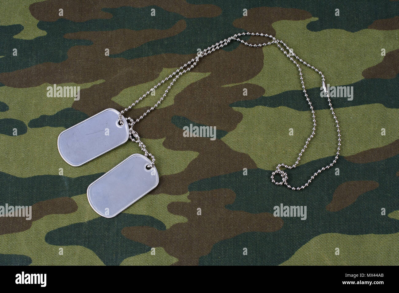 dog tags on russian camouflage uniform background Stock Photo - Alamy