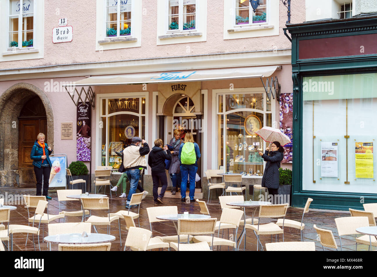 Salzburg, Austria - October 21, 2017: People come in and out of the famous cafe confectionery Furst Stock Photo