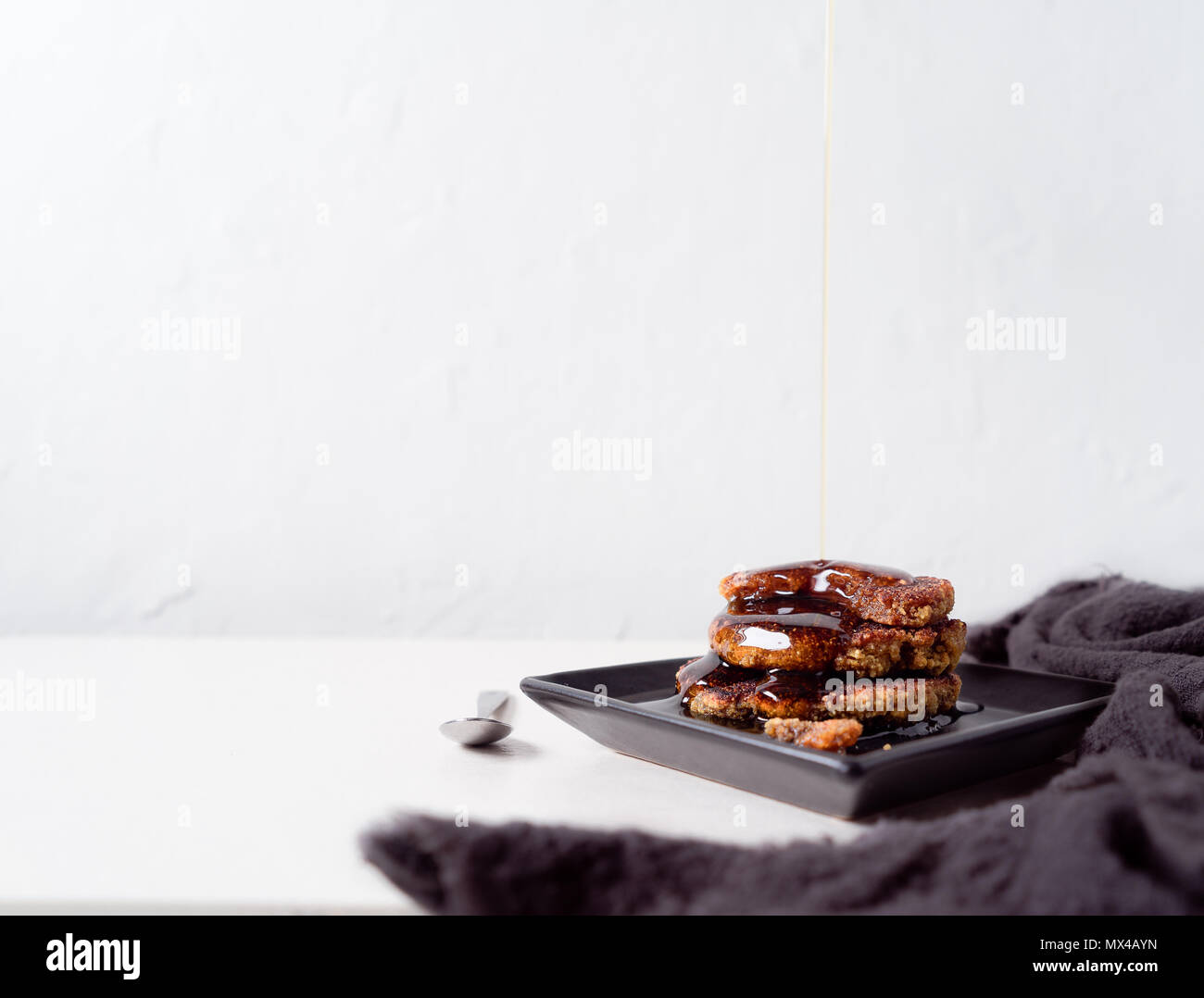 Quinoa Pancake Stack with Maple Syrup. Healthy Breakfast Stock Photo