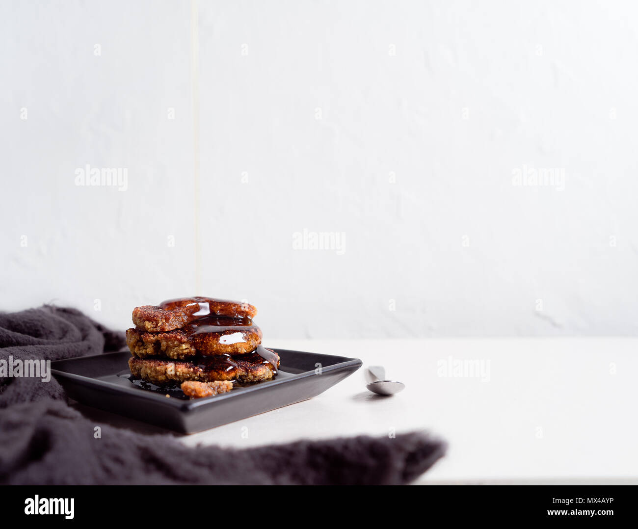 Quinoa Pancake Stack with Maple Syrup. Healthy Breakfast Stock Photo