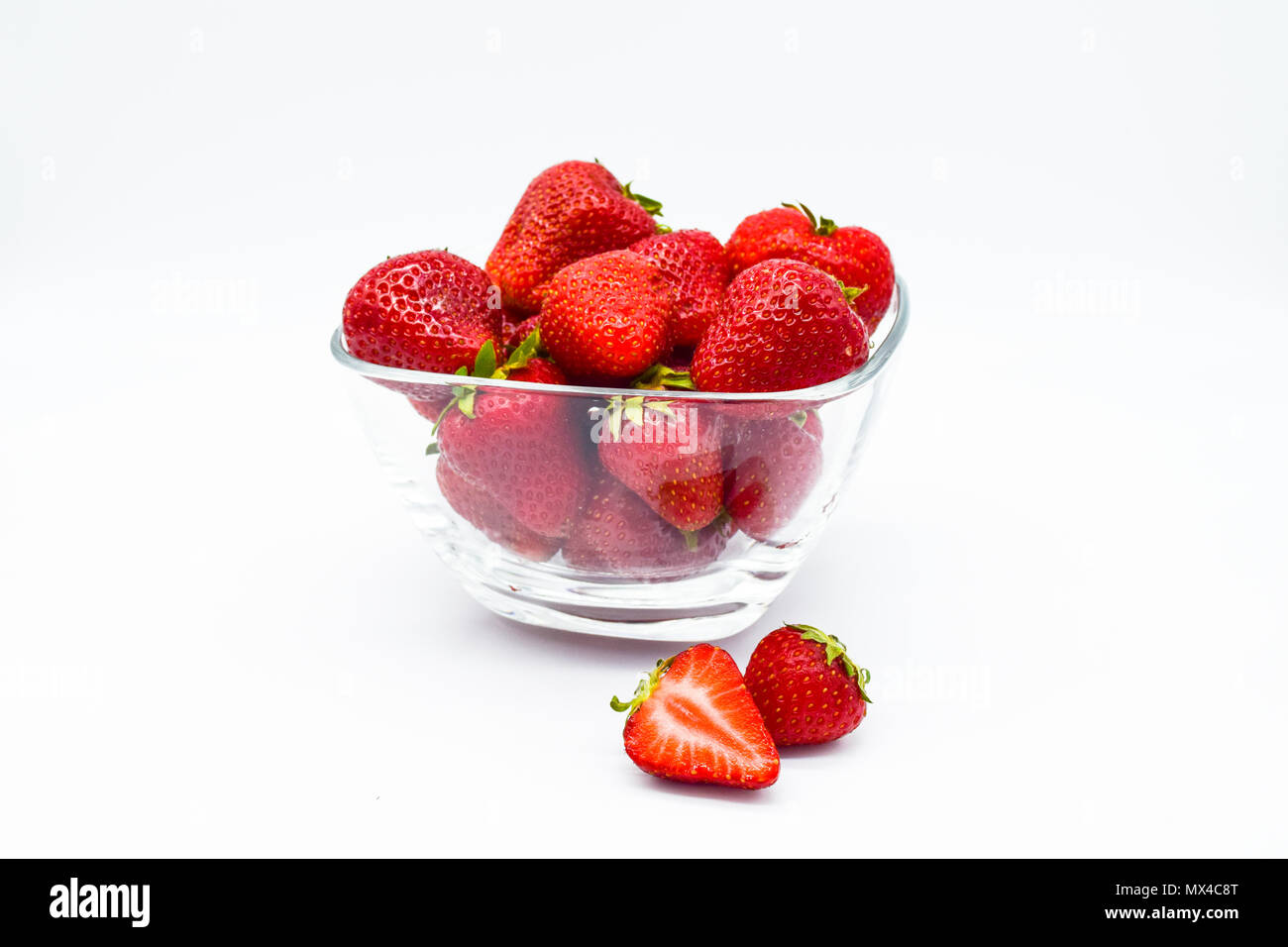 Bowl of strawberries isolated on white background Stock Photo - Alamy