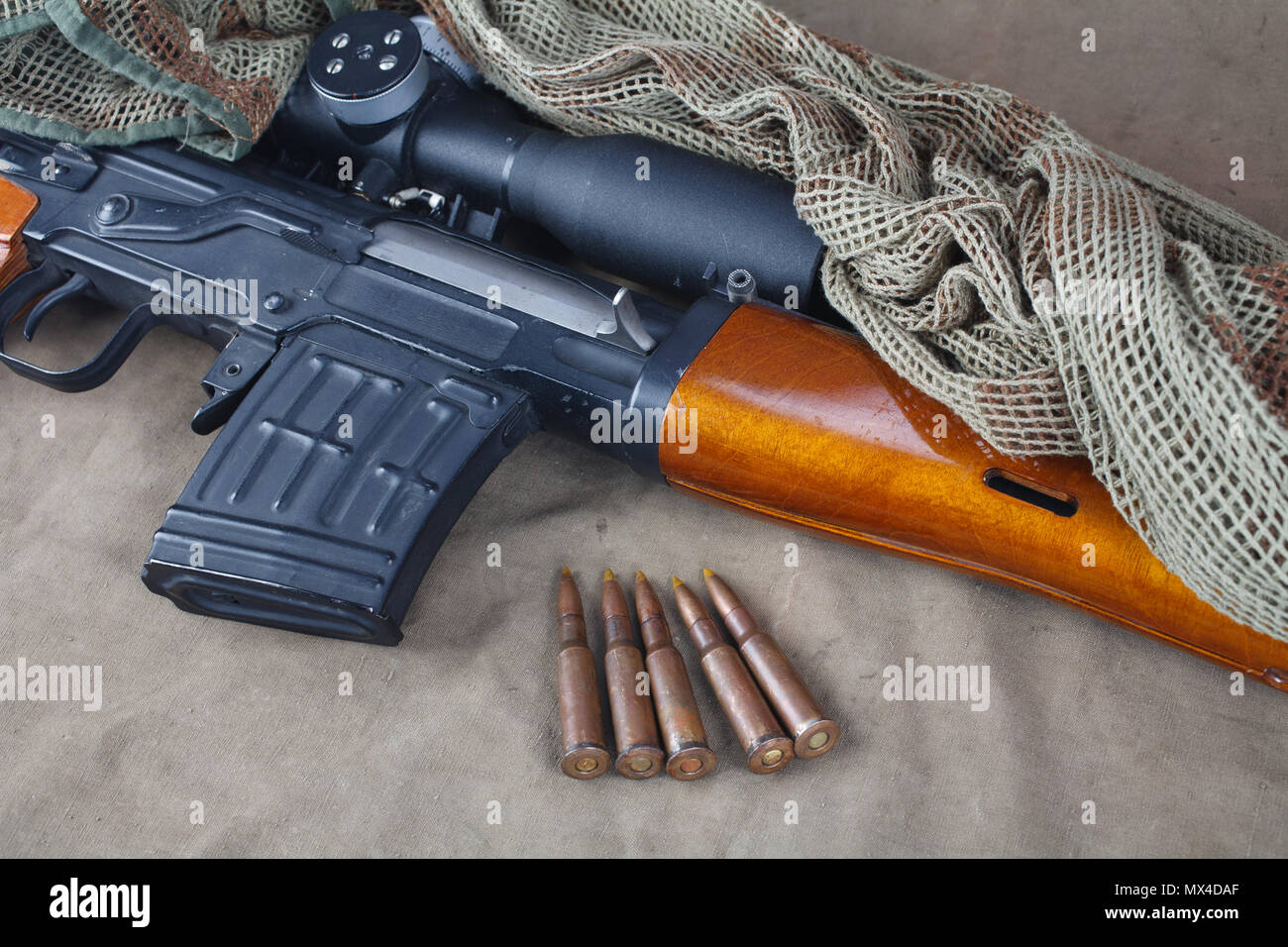SVD sniper rifle on khaki canvas background Stock Photo - Alamy