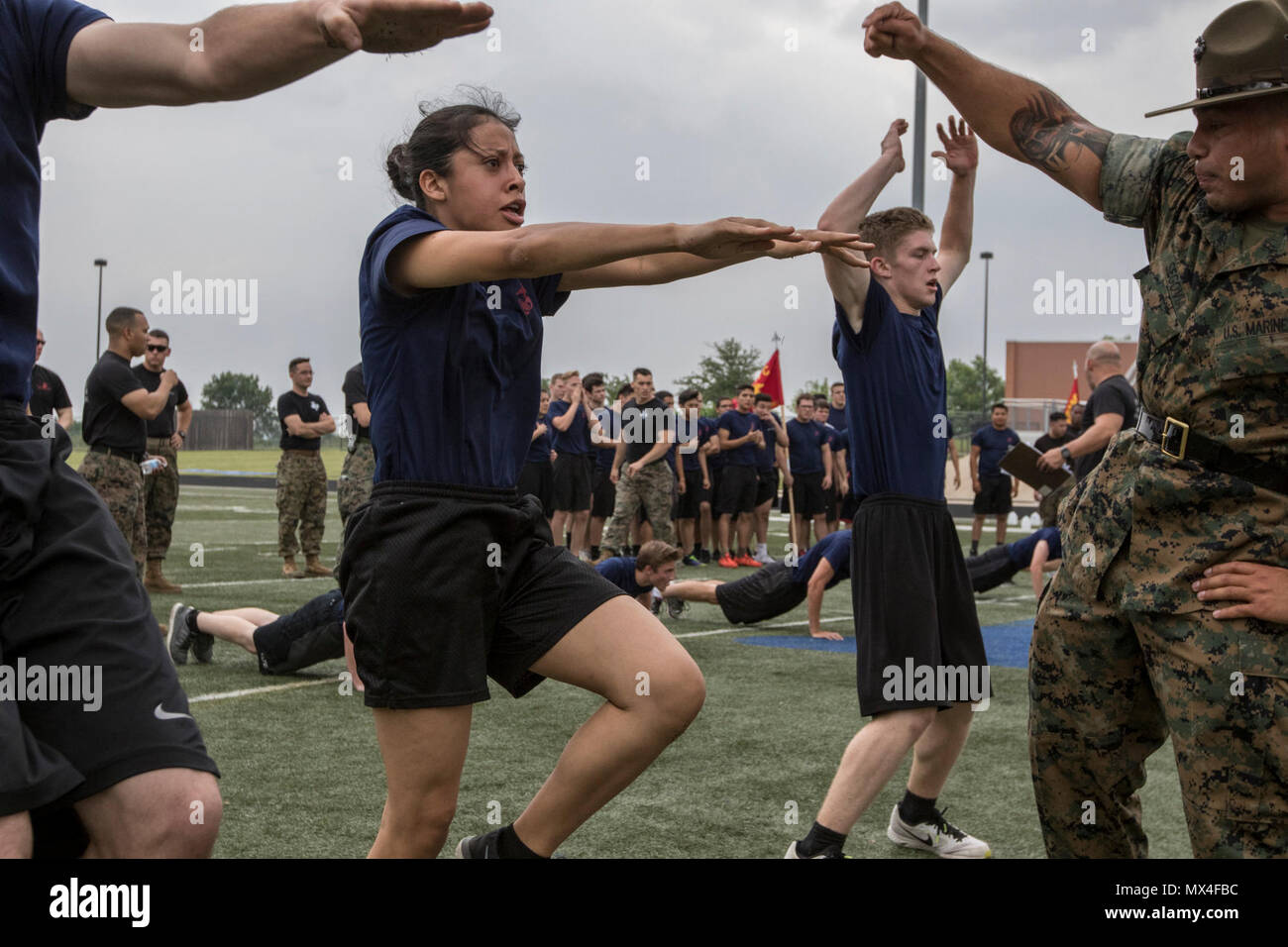 Future Marines get motivated by a drill instructor during Recruiting Station Fort Worth's Annual Pool Function aboard Brewer High School, April 29. The overnight event included an Initial Strength Test, field meet competition and fun with some drill instructors. (Marine Corps  Sgt. Danielle Rodrigues/Released) Stock Photo