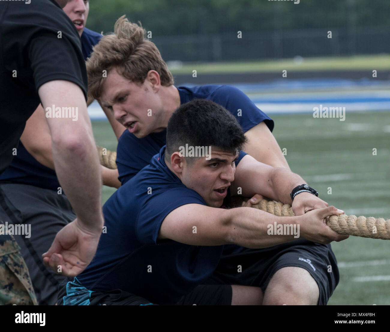 Future Marines participate in a tug-of-war challenge during Recruiting Station Fort Worth's Annual Pool Function aboard Brewer High School, April 29. The overnight event included an Initial Strength Test, field meet competition and fun with some drill instructors. (Marine Corps  Sgt. Danielle Rodrigues/Released) Stock Photo