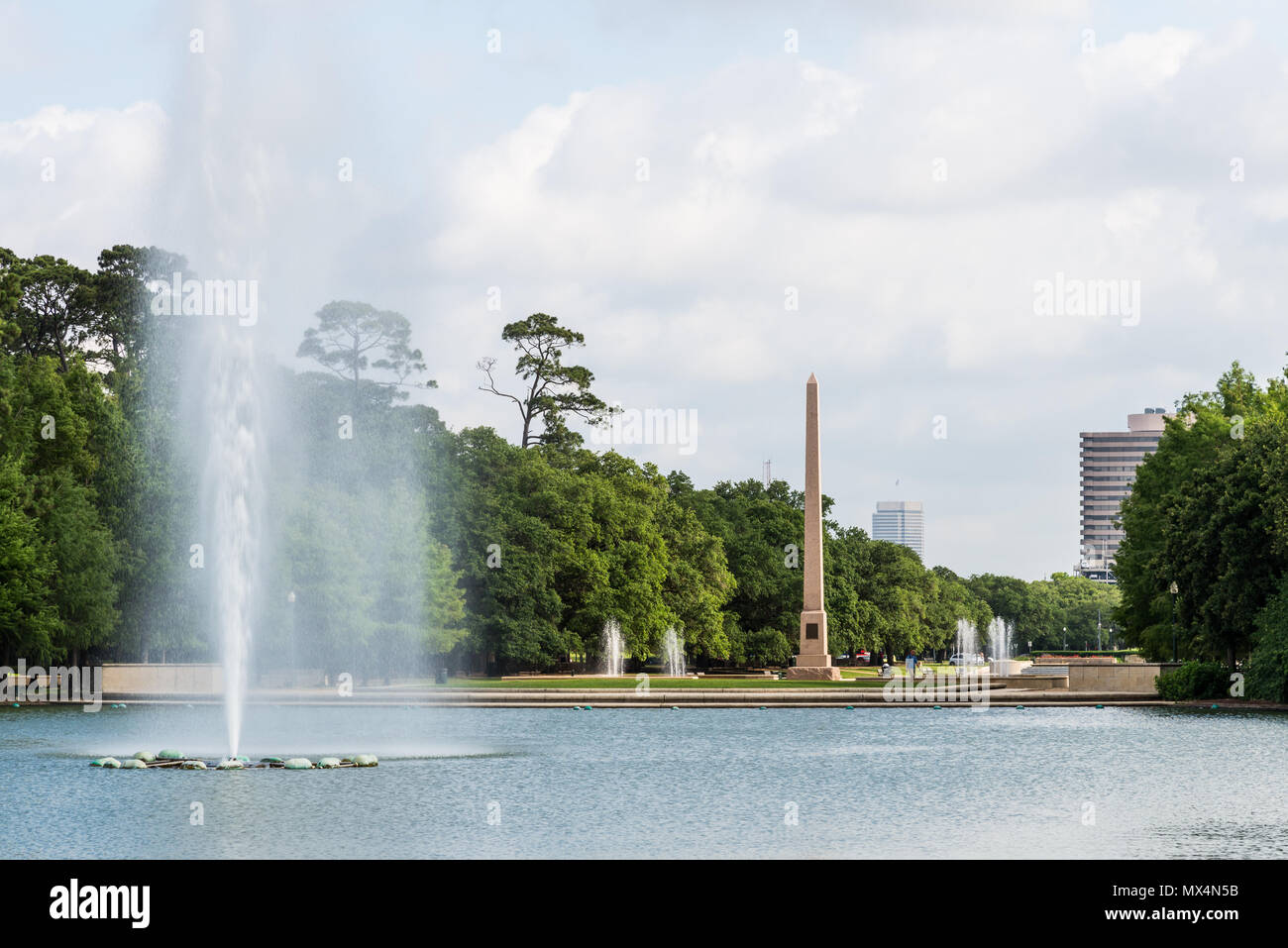 The Pioneer Memorial obelisk and water fountain at Hermann Park. Houston, Texas, USA. Stock Photo