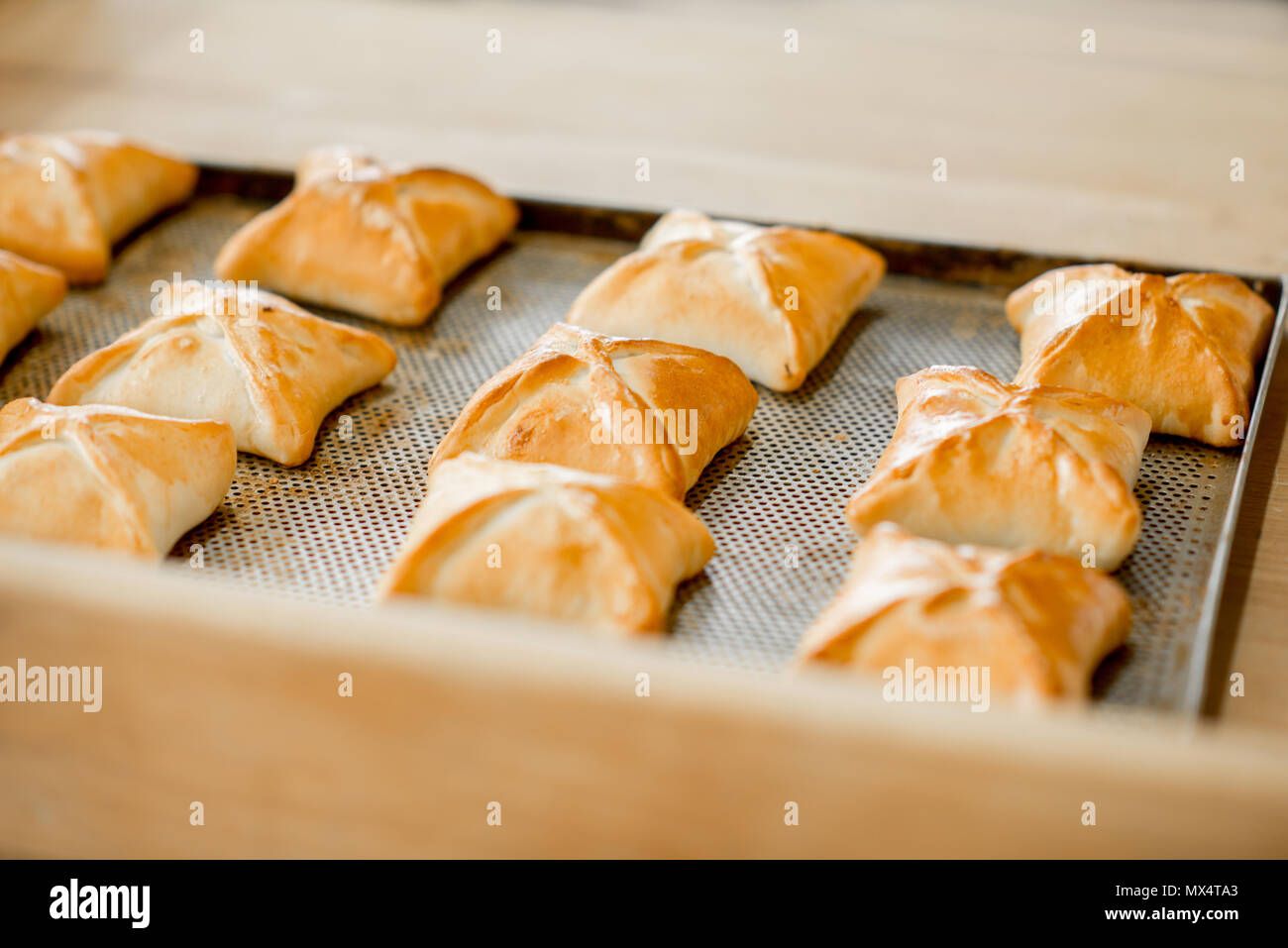 Freshly baked buns at the manufacturing Stock Photo