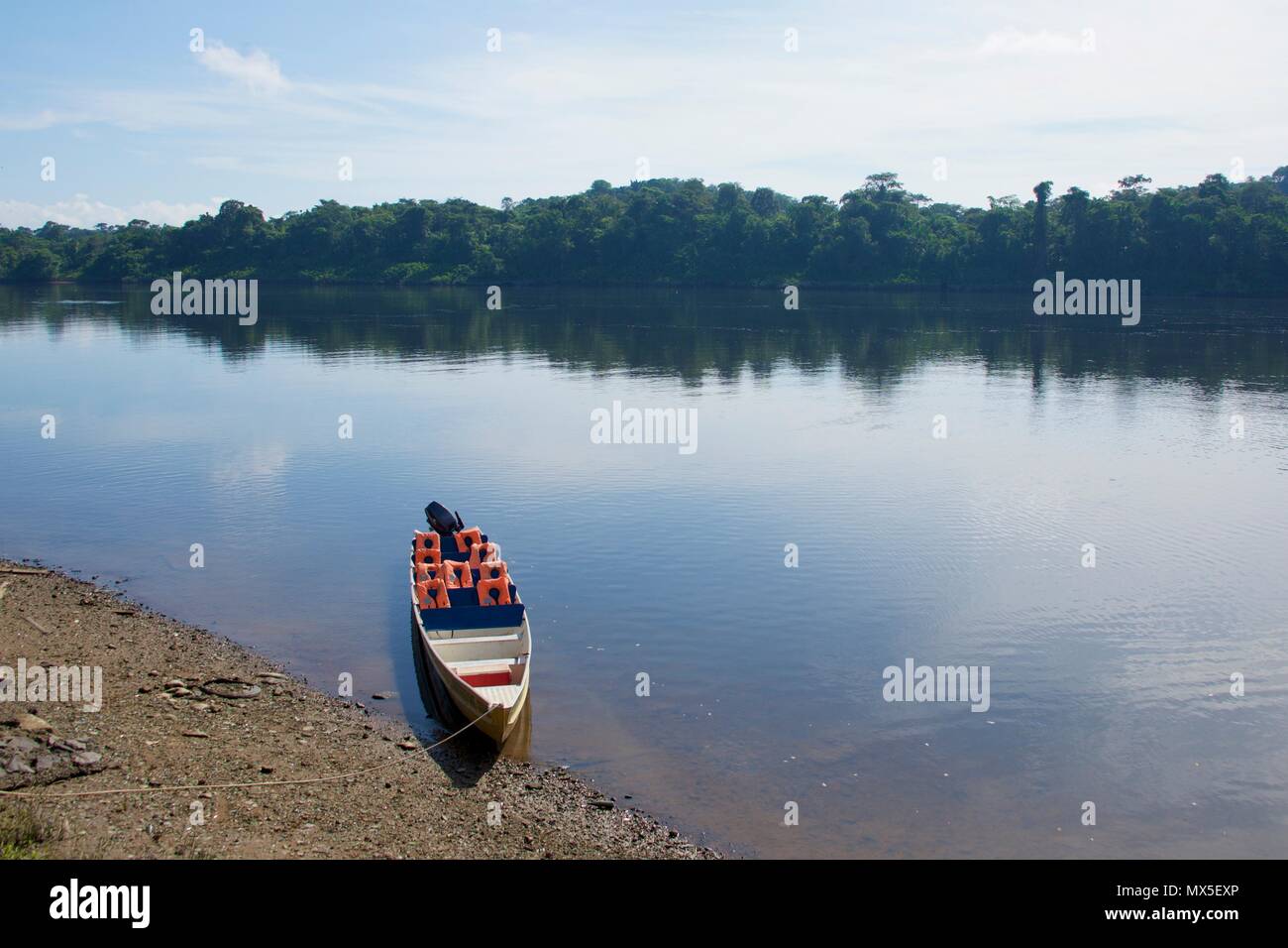 Riverboat rests on the banks of the Approuague River in Regina, French Guyana Stock Photo