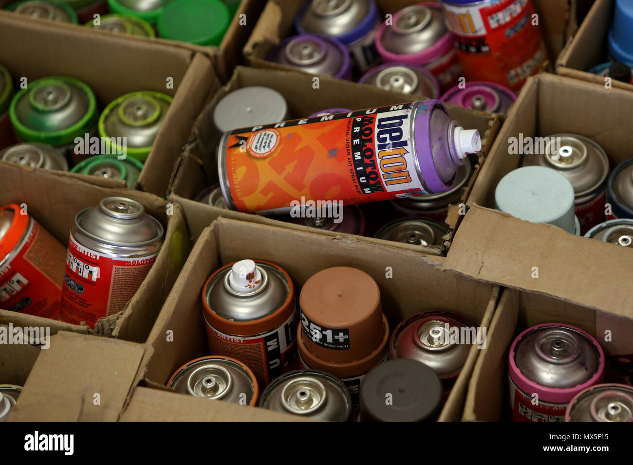 Graffiti spray paint cans pictured in boxes in Bognor Regis, West