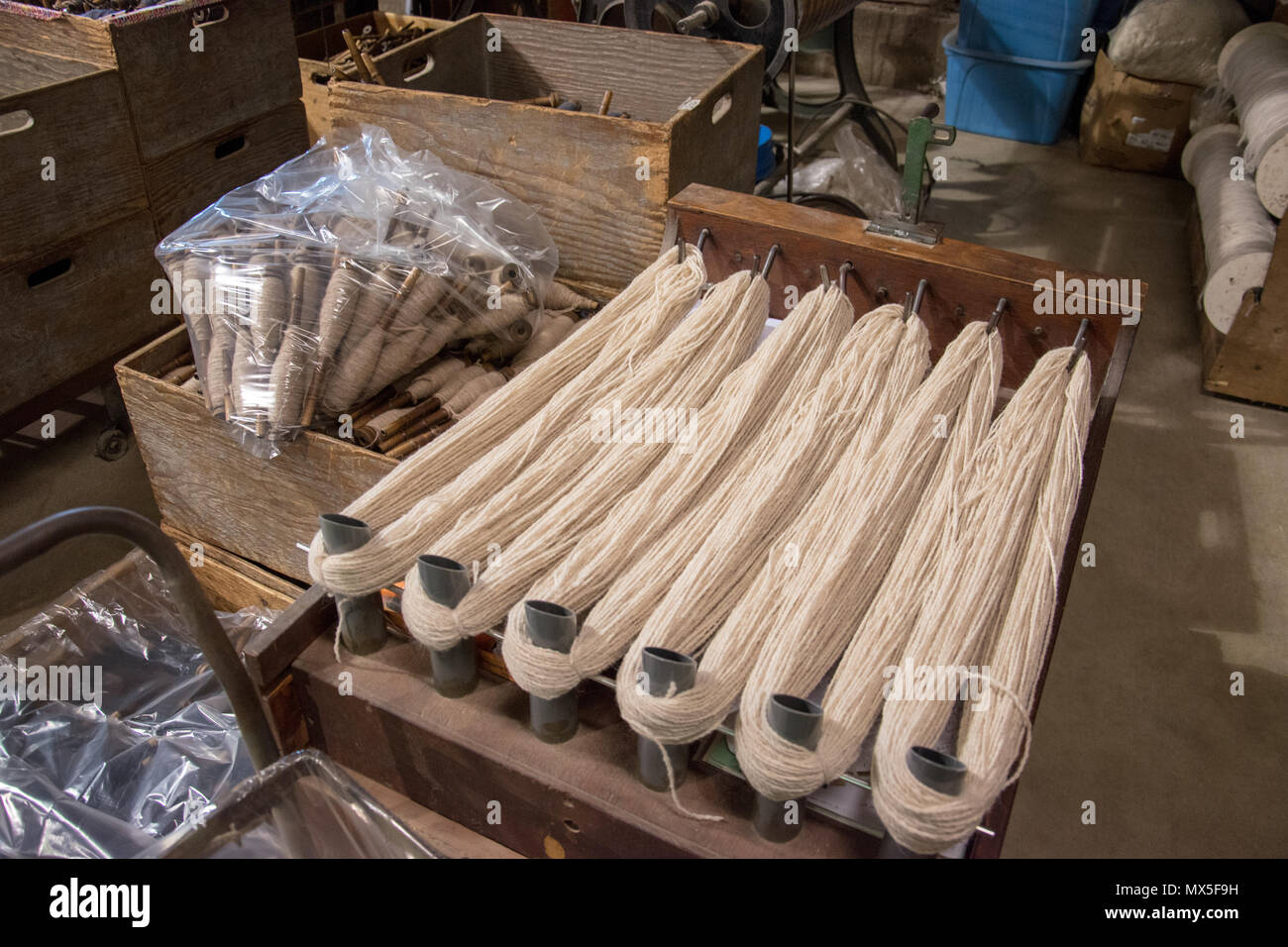 Worsted Yarns ready to be wound into skeins. Custom Woolen Mills, Carstairs, Alberta. Stock Photo