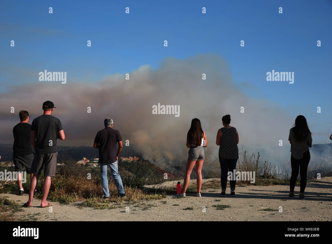 Jun 2, 2018 Aliso Viejo, California, U.S. Residents watch a brush