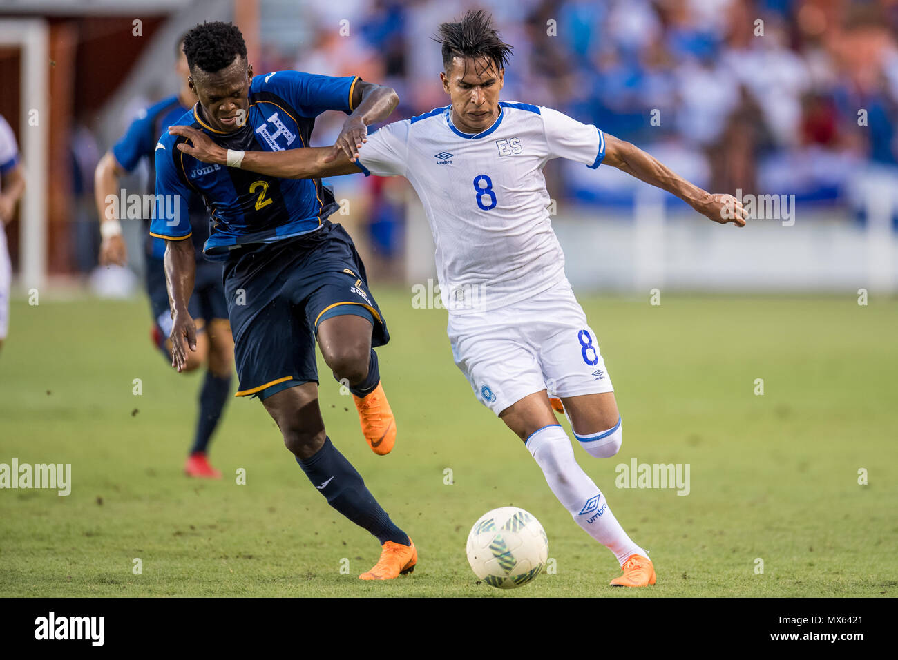 Houston, TX, USA. 2nd June, 2018. El Salvador midfielder Dennis Torres (8) controls the ball in front of Honduras defender Felix Crisanto (2) during an international soccer friendly match between Honduras and El Salvador at BBVA Compass Stadium in Houston, TX. El Salvador won the game 1 to 0.Trask Smith/CSM/Alamy Live News Stock Photo