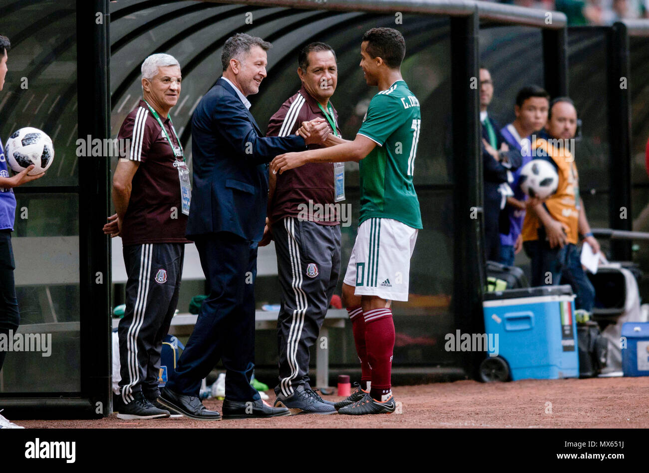 Mexico City, Mexico. 2nd June, 2018. Giovani Dos Santos (R front) of Mexico celebrates his goal with Mexico's head coach Juan Carlos Osorio (L2) during the international friendly match against Scotland before the 2018 FIFA World Cup in Mexico City, capital of Mexico, June 2, 2018. Credit: Luis Licona/STRAFFON IMAGES/Xinhua/Alamy Live News Stock Photo