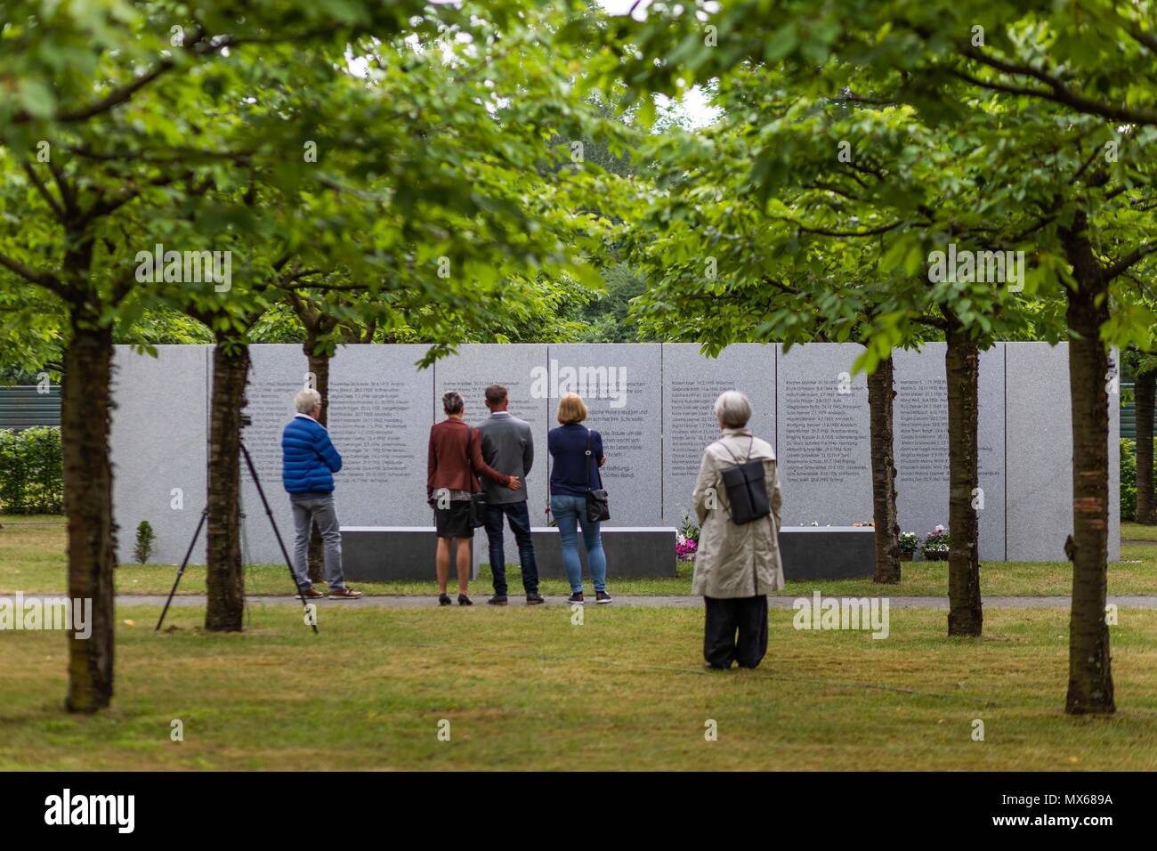 03 May 2018, Germany, Eschede: Visitors commemorating the victims of the train accident in Eschede for the 20th anniversary of the accident. The ICE 'Wilhelm Conrad Roentgen' derailed on the 3 June 1998 at tempo 200 and drove into a highway bridge. 101 people died. Photo: Philipp von Ditfurth/dpa Stock Photo