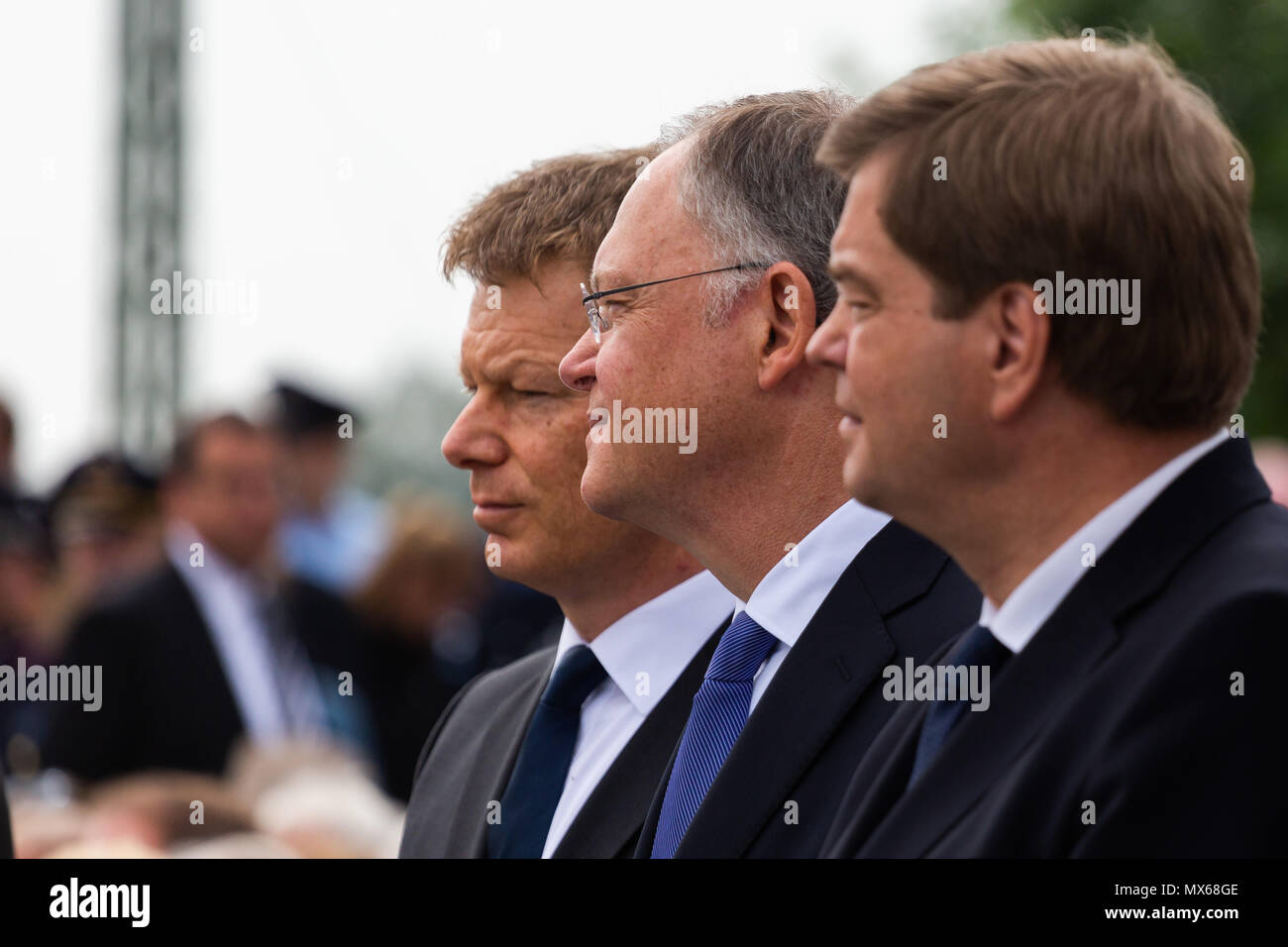 Eschede, Germany. 03 May 2018, Germany, Eschede: The Parliamentary State Secretary from the Christian Democratic Union (CDU), Enak Ferlemann (L-R), the Premier of Lower Saxony from the Social Democratic Party (SPD), Stephan Weil, and Chairman of the Deutsche Bahn, Richard Lutz, commemorating the victims of the train accident in Eschede for the 20th anniversary of the accident. The ICE 'Wilhelm Conrad Roentgen' derailed on the 3 June 1998 at tempo 200 and drove into a highway bridge. 101 people died. Photo: Philipp von Ditfurth/dpa Stock Photo