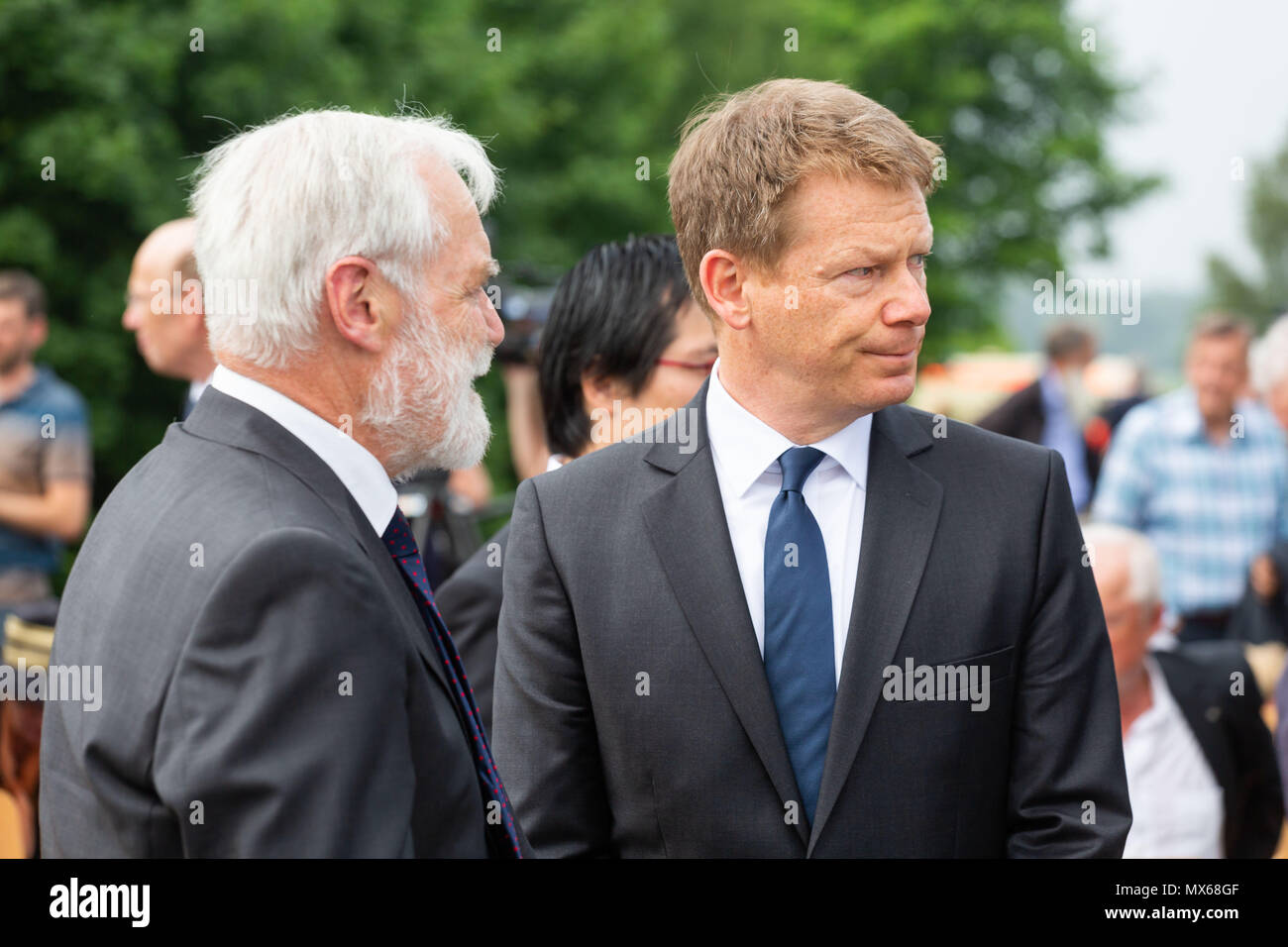Eschede, Germany. 03 May 2018, Germany, Eschede: The spokesman from 'Selbsthilfe Eschede' (lit. self-help Eschede', Heinrich Loewen, and Chairman of the Deutsch Bahn, Richard Lutz, after the memorial event for the 20th anniversary of the train accident in Eschede. The ICE 'Wilhelm Conrad Roentgen' derailed on the 3 June 1998 at tempo 200 and drove into a highway bridge. 101 people died. Photo: Philipp von Ditfurth/dpa Stock Photo