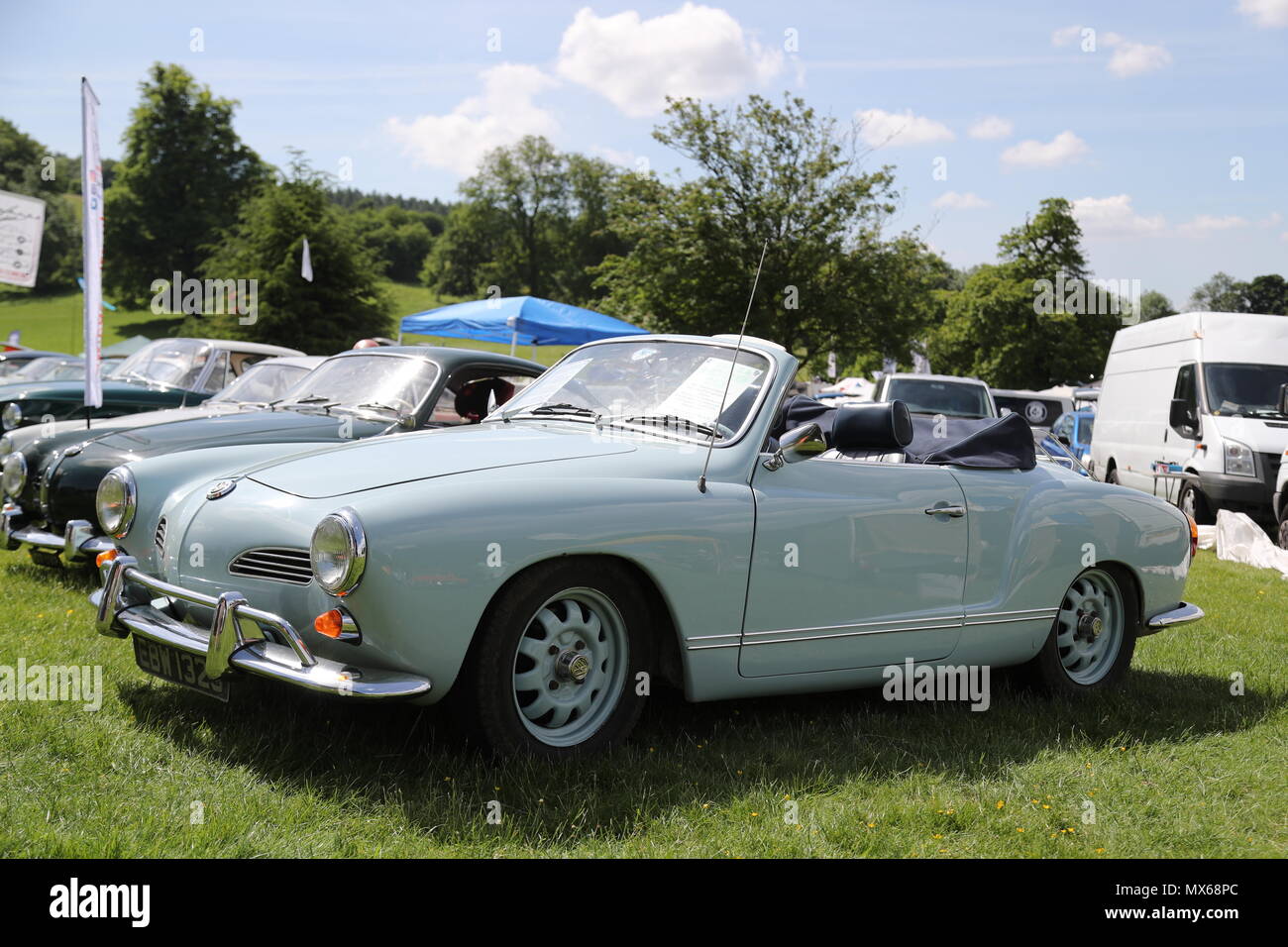 Stonor, Oxfordshire, UK. 3rd Jun, 2018. All types of historic Volkswagen cars and vans were displayed at this years's gathering of their owners. Fans could get close to well-loved vehicles from the German car manufacturer, which created its reputation for durability  and Hippie appeal in the 60s. On the basis of the beetle the Carman Ghia sports car was developed in the 60s. Credit: Uwe Deffner/Alamy Live News Stock Photo