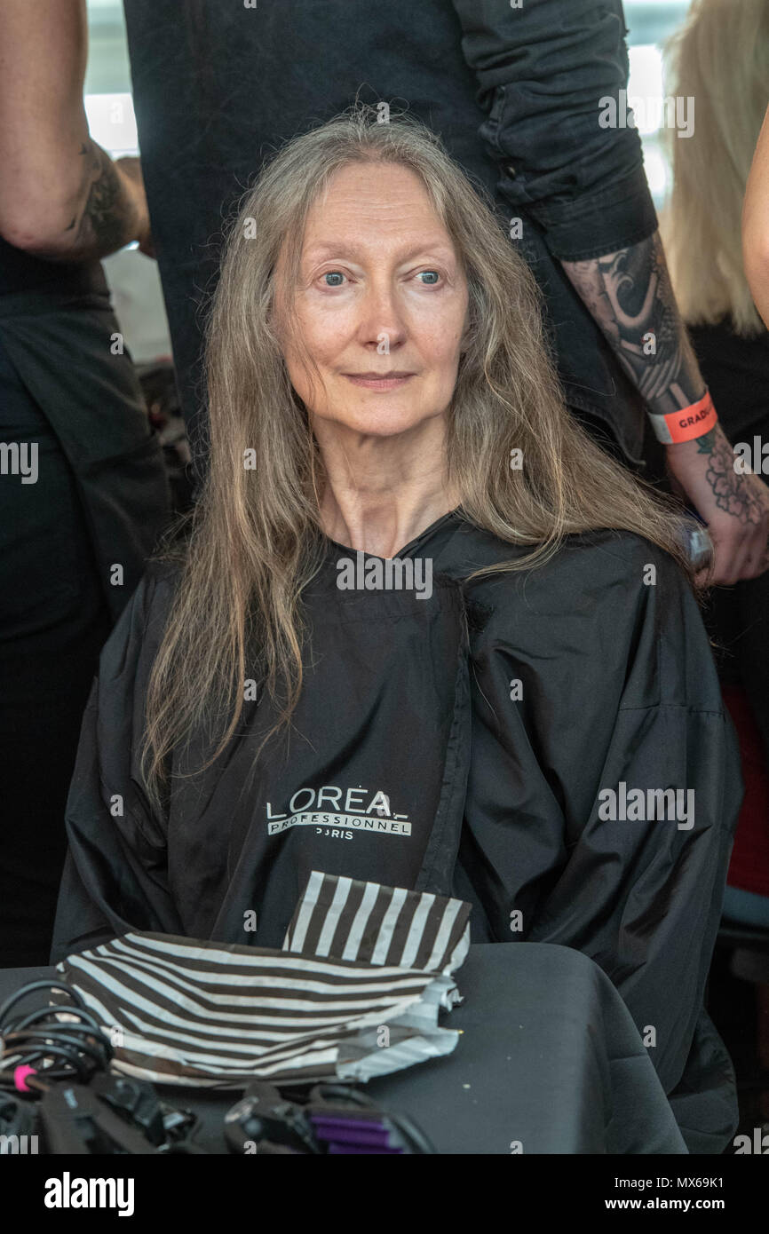 London 3rd June 2018, Graduate Fashion Week,2018 London Backstage in the Makeup area with an older female model Credit Ian Davidson/Alamy Live News Stock Photo