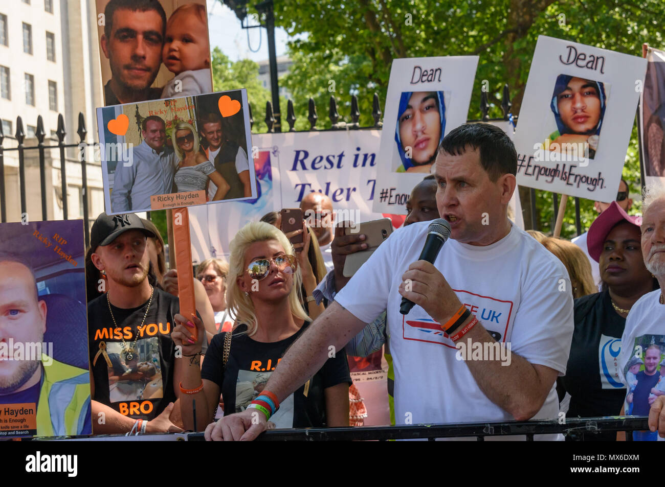 London, UK. 3rd June 2018. Danny O'Brien, awarded the BCAc for his campaign  against knife crime speaks at the protest by community groups and  campaigners against knife and gun crime opposite Downing