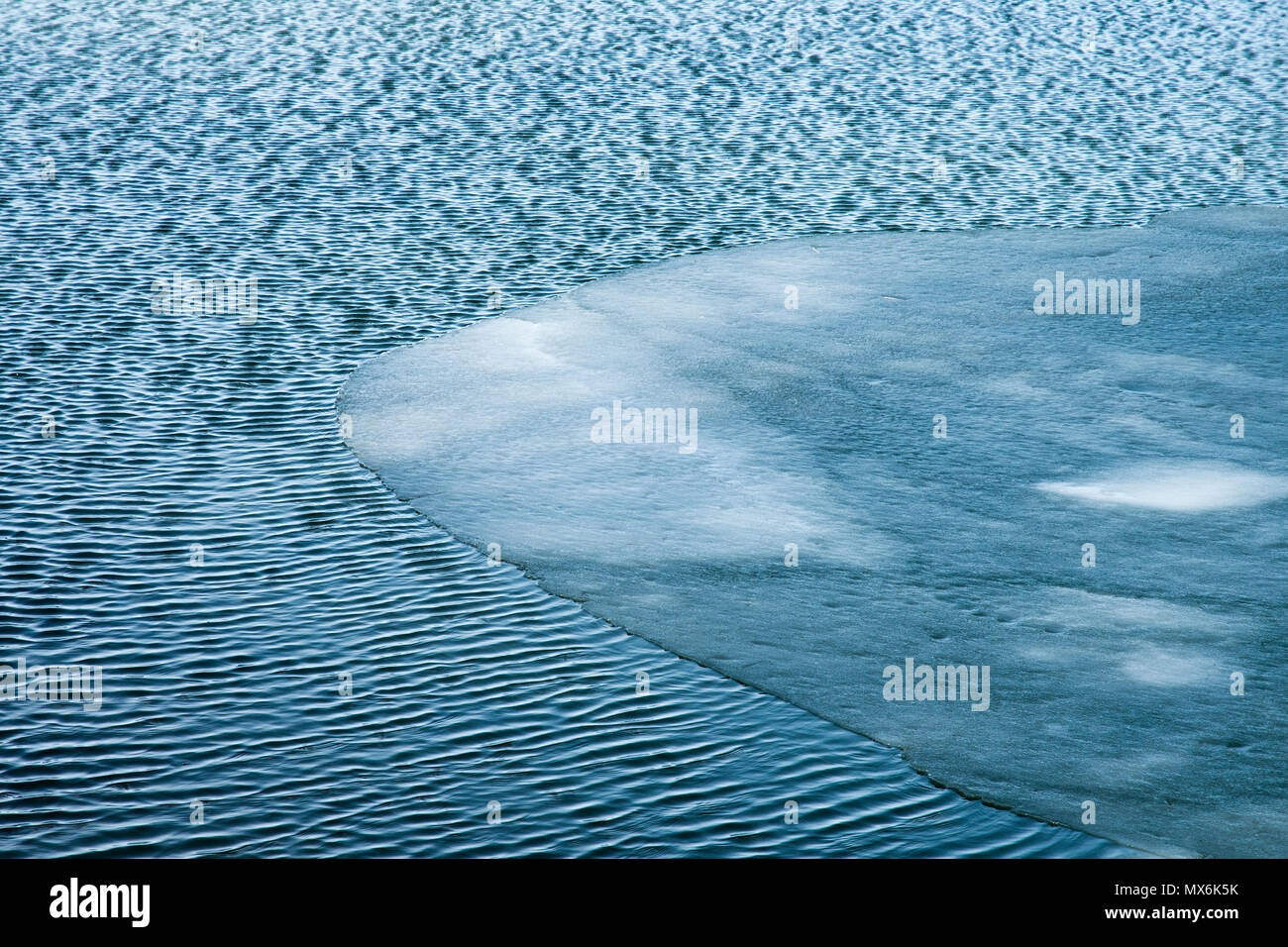 Winter Water Ripple Ice and water with ripple Stock Photo - Alamy