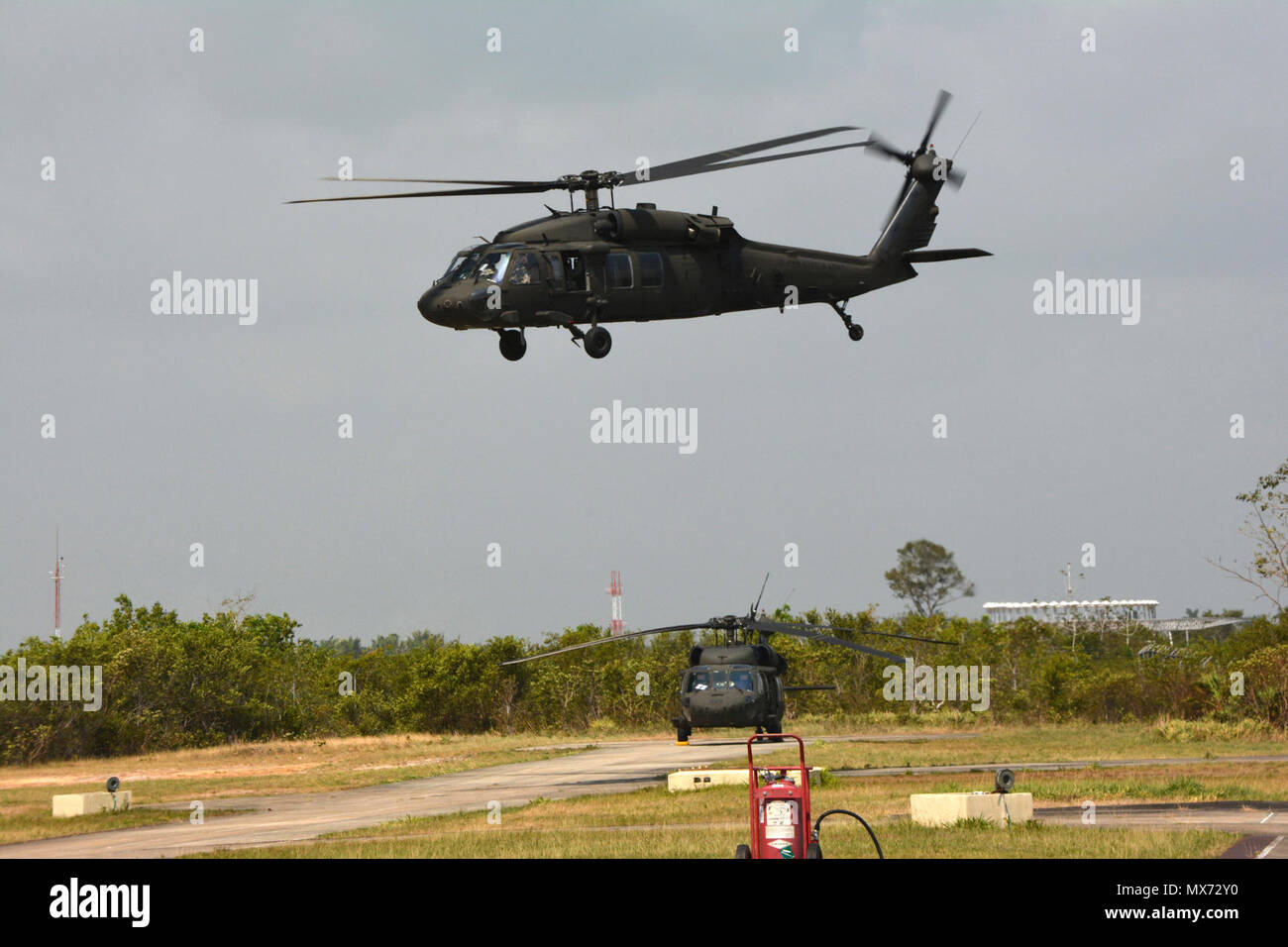 A Uh 60 Black Hawk Helicopter With The 1 150th Assault Helicopter Battalion New Jersey Army National Guard Hovers Above Price Barracks Belize Defense Force Headquarters Ladyville Belize May 1 17 The 1 150th Provided