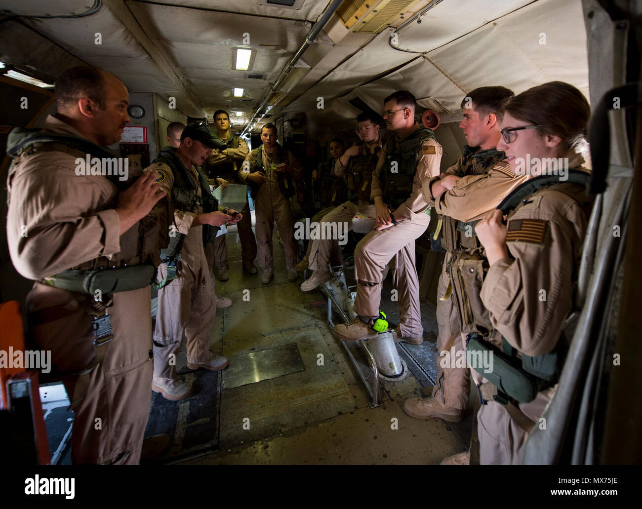 U.S. Naval aircrew assigned to Patrol Squadron FORTY-SIX (VP-46), hold ...