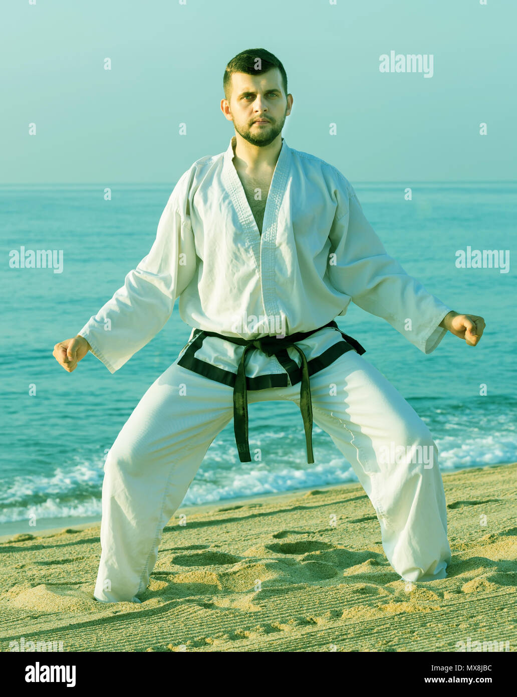Man jumping sky taekwondo hi-res stock photography and images - Alamy