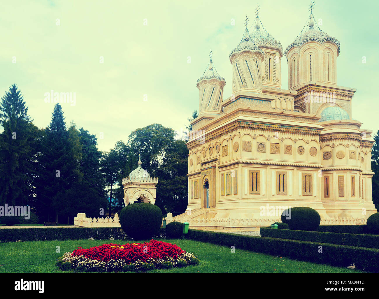 View of Romanian Orthodox Cathedral of Curtea de Arges in sunny autumn ...