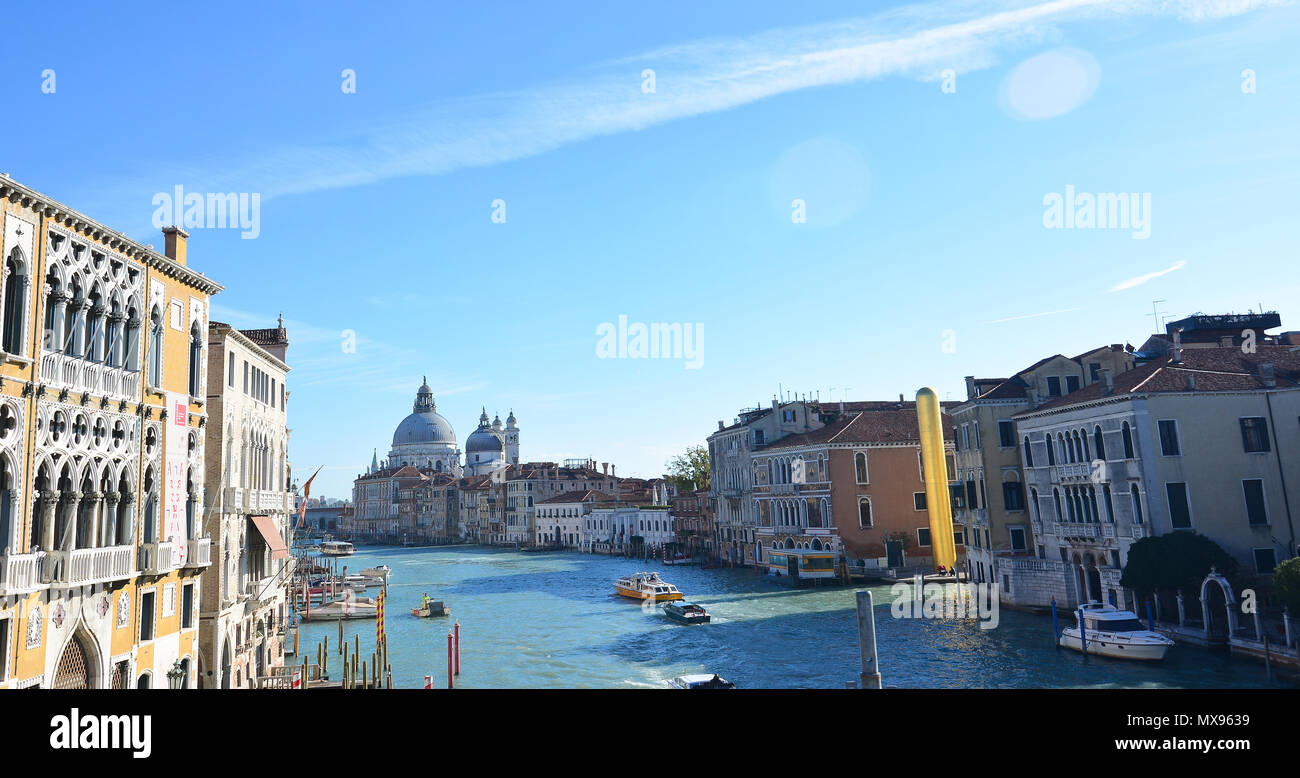 The Grand Canal in the Accademia neighborhood with the cathedral of Santa Maria Della Salute in the background, Venice Stock Photo