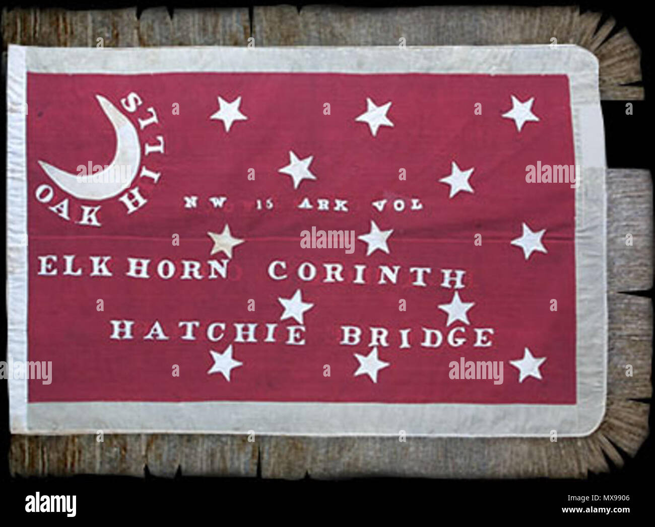 . English: Major-General Earl Van Dorn adopted this flag design for the Army of the West in February 1862, citing confusion with the Stars and Stripes. The design bears no resemblance to Union or Confederate standards with its red field, stars to represent the thirteen states, and the yellow crescent to represent Missouri. Probably presented after Hatchie Bridge, Tennessee, on 5 October 1862, the flag and its bearer were captured near Port Gibson, Mississippi, 1 May 1863. It is the only known Van Dorn flag to carry battle honors and unit designation. Physical Description: Van Dorn's Battle Fla Stock Photo