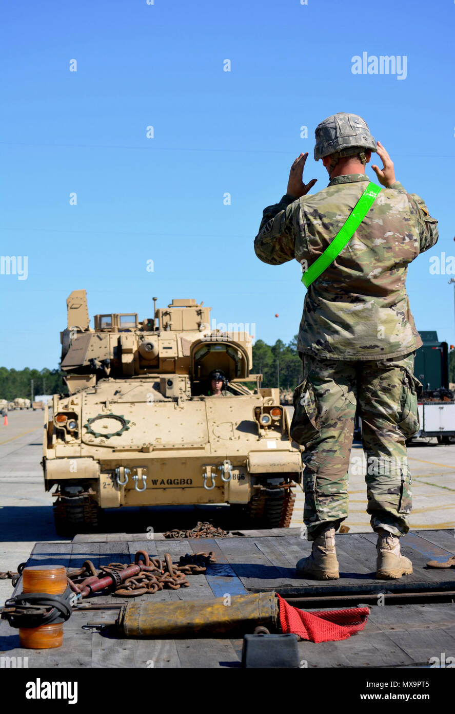 Soldiers from Company B, 2nd Battalion, 7th Infantry Regiment load a
